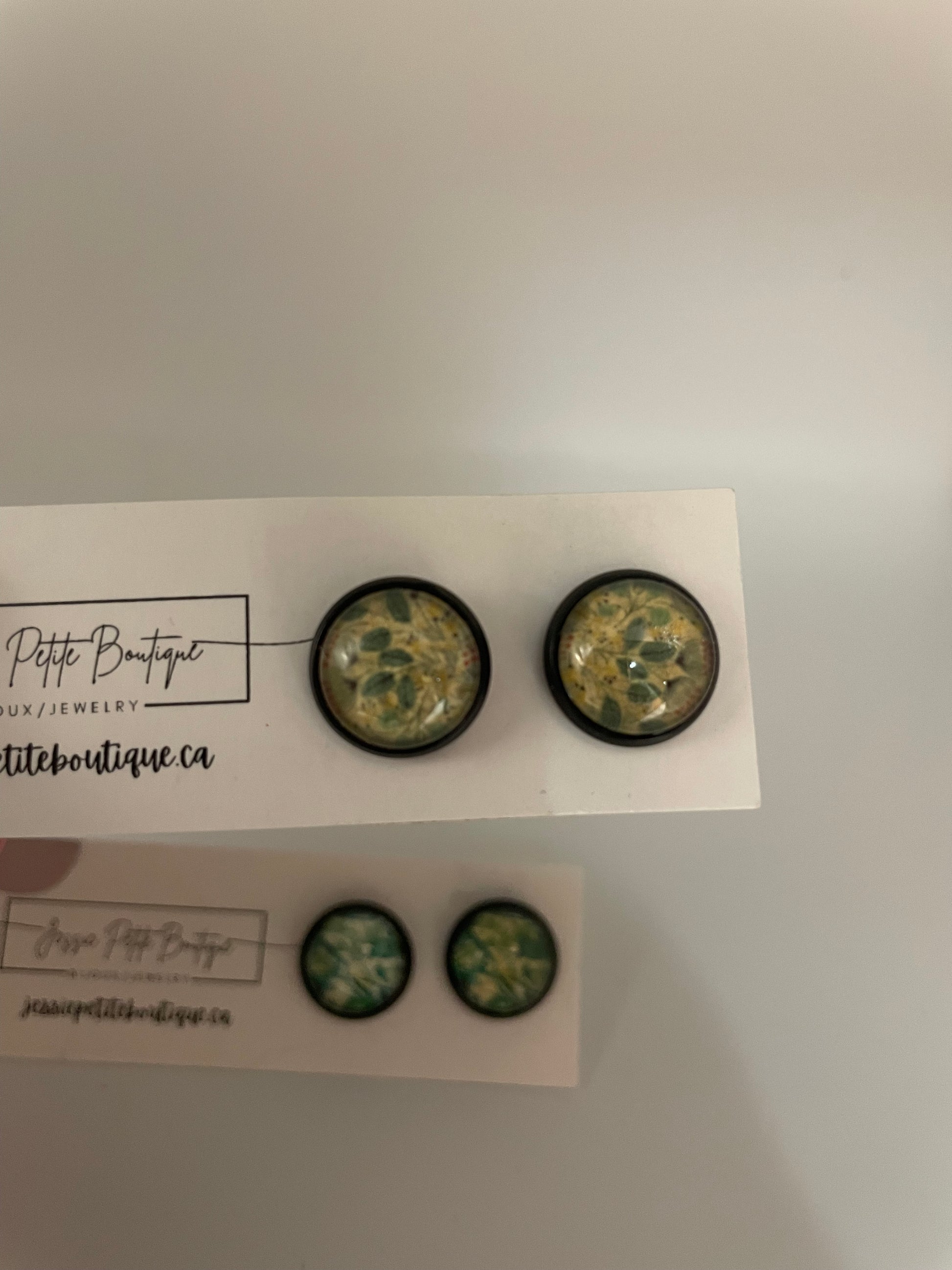 Four green buttons with black borders on a white card with 'Prette Boutique' branding.