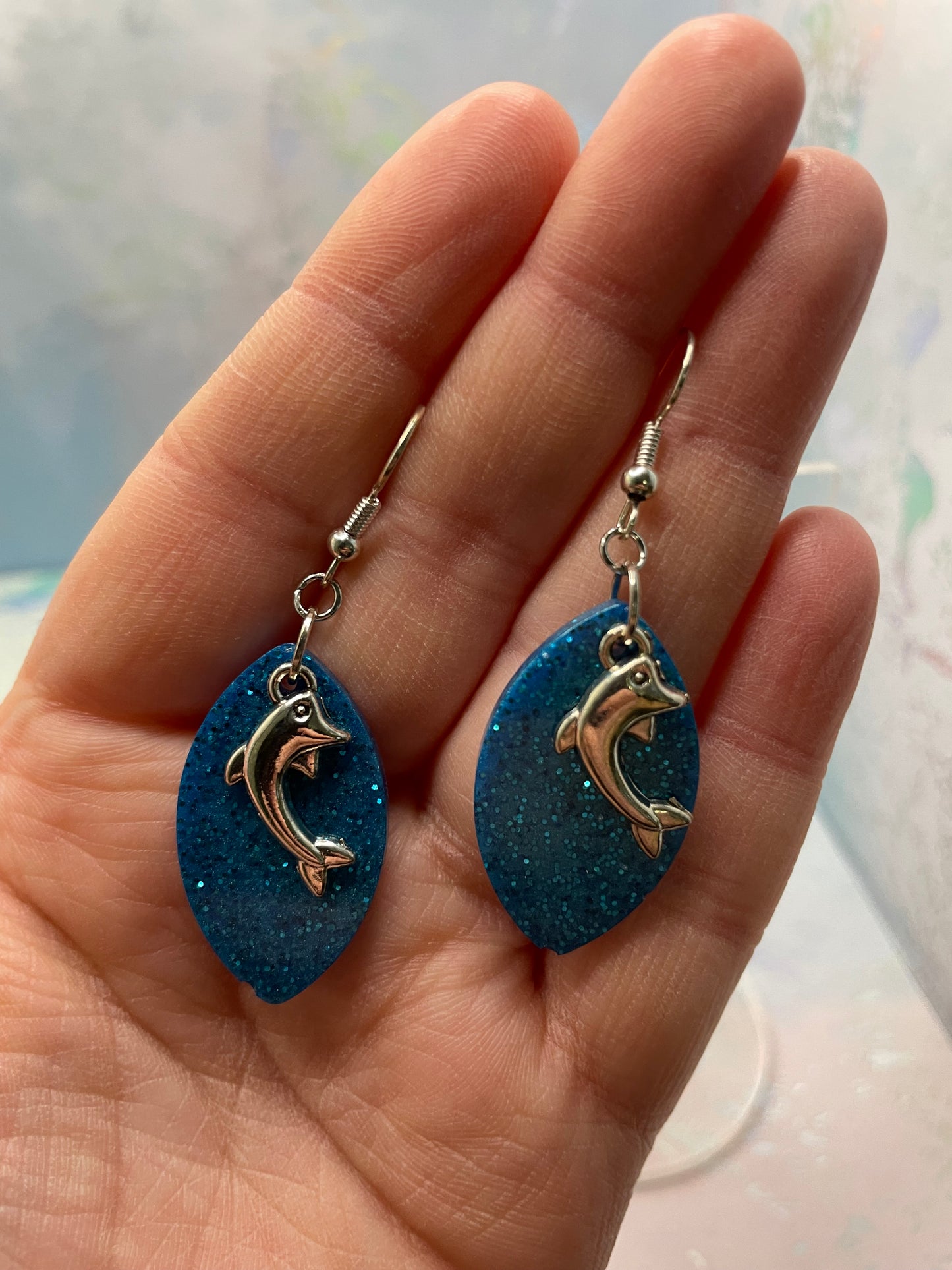 Sparkly Blue Oval Earrings with Dolphin Charm- NICKEL FREE