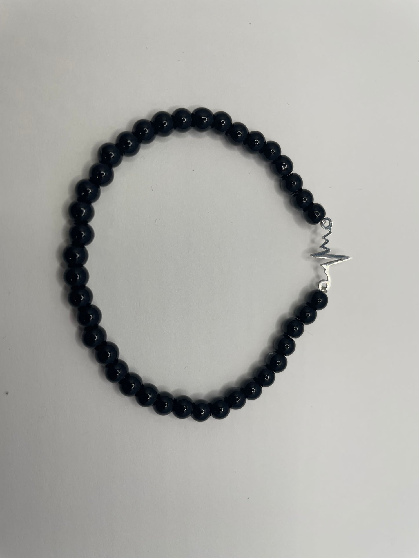Bracelet en Billes Noires avec Breloque Électrocardiogramme