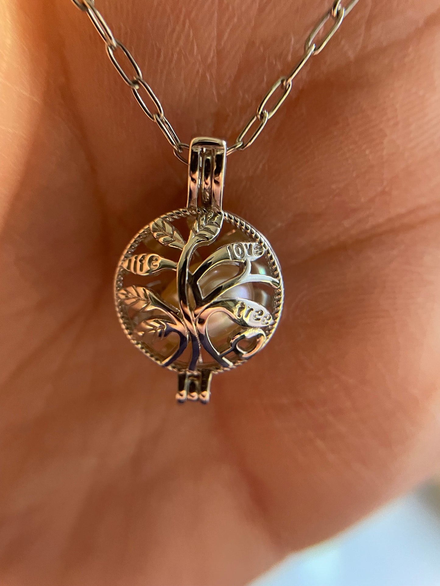 Collier cage arbre de vie avec perle rose