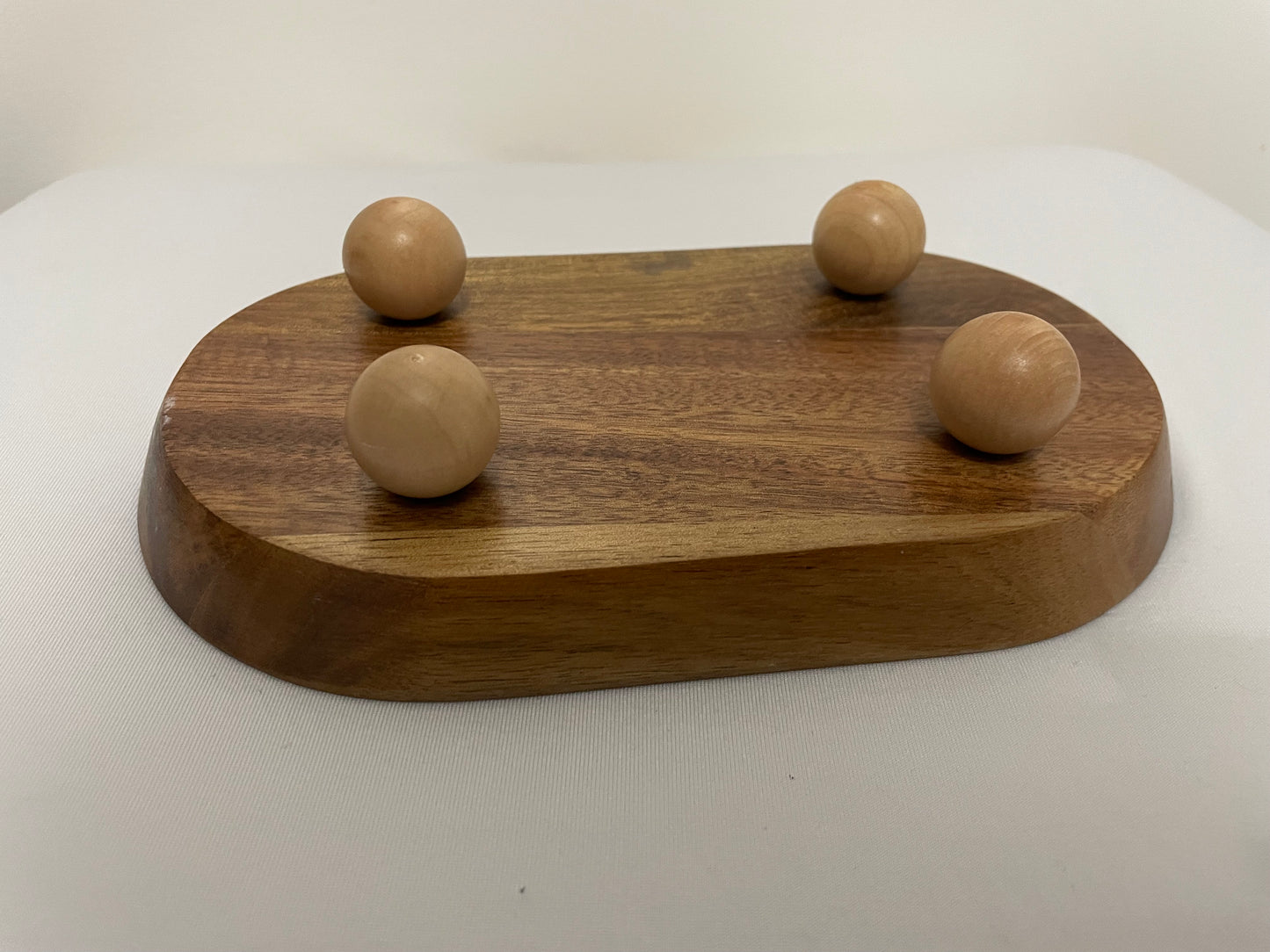 dried flowers on small oval wooden tray