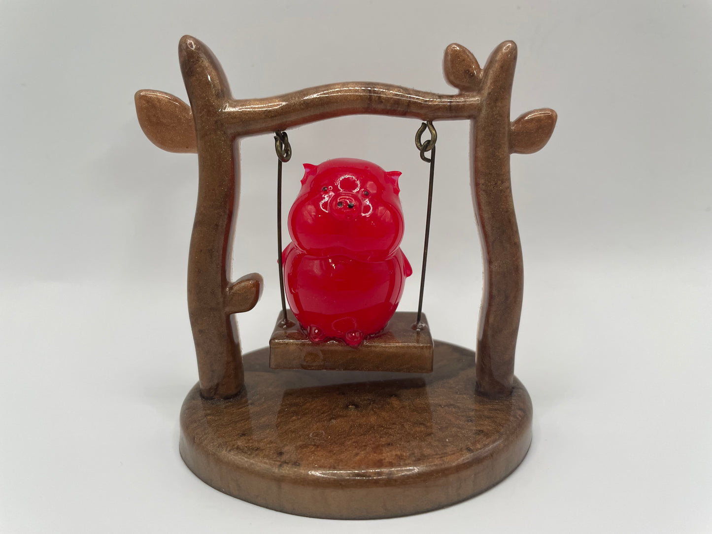 Pig on a Swing – Handmade Resin Figurine