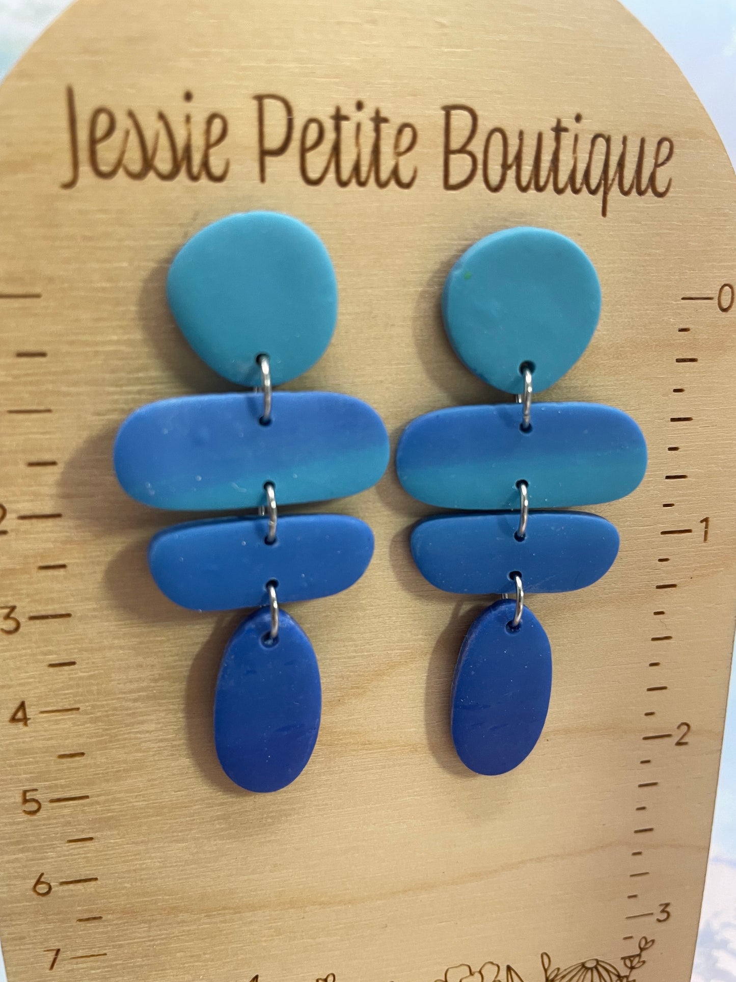 Boucles d’oreilles géométriques abstraites en argile polymère