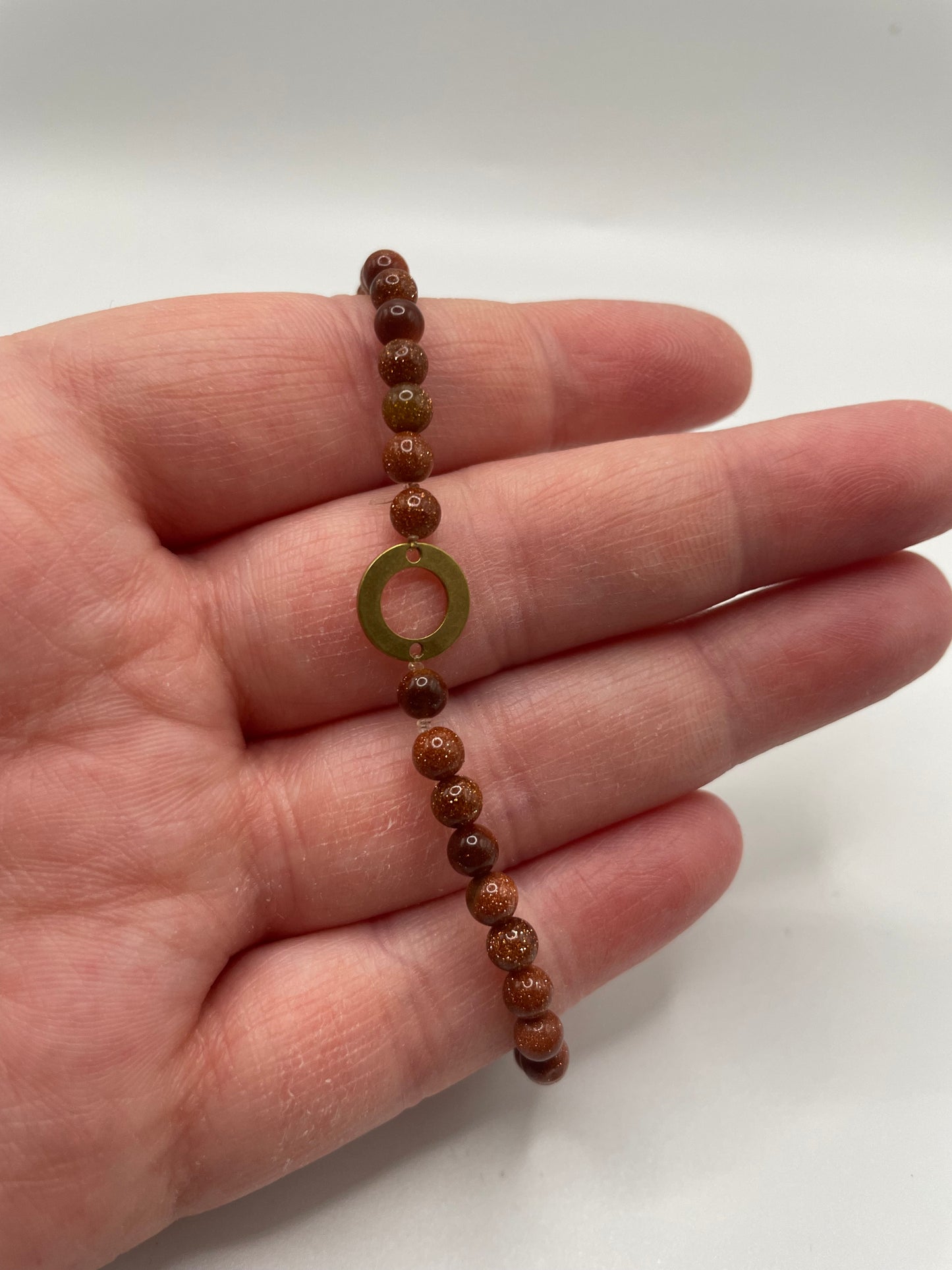 Goldstone Beaded Bracelet with Brass Circle Charm