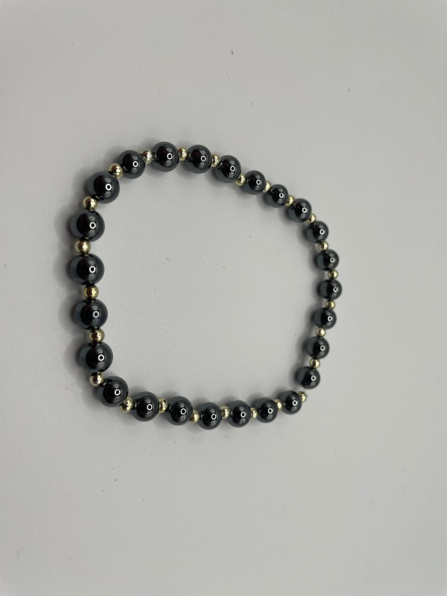 Metallic Hematite-Style Beaded Bracelet with Gold Accents