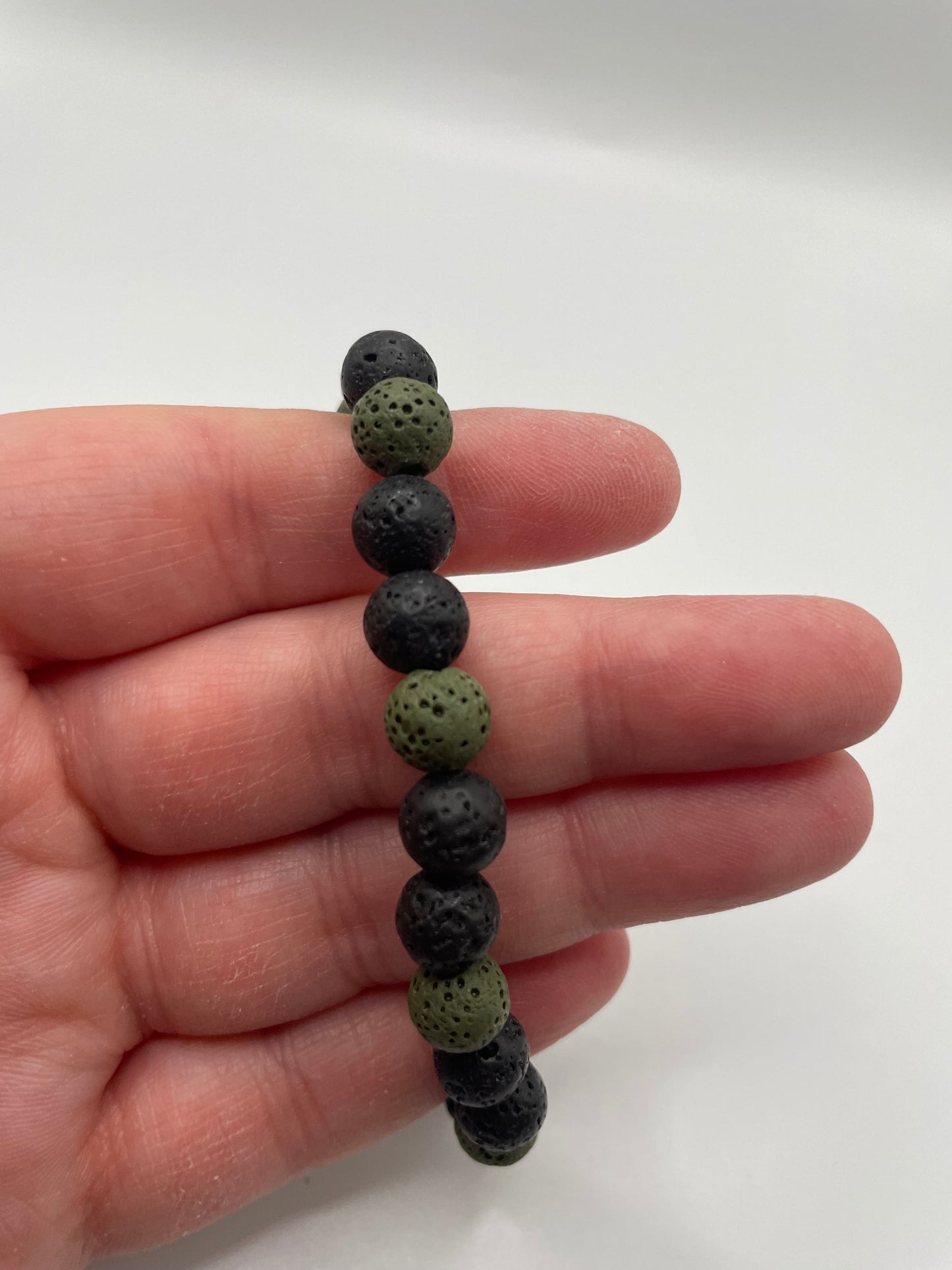 Black and Green Lava Bead Bracelet