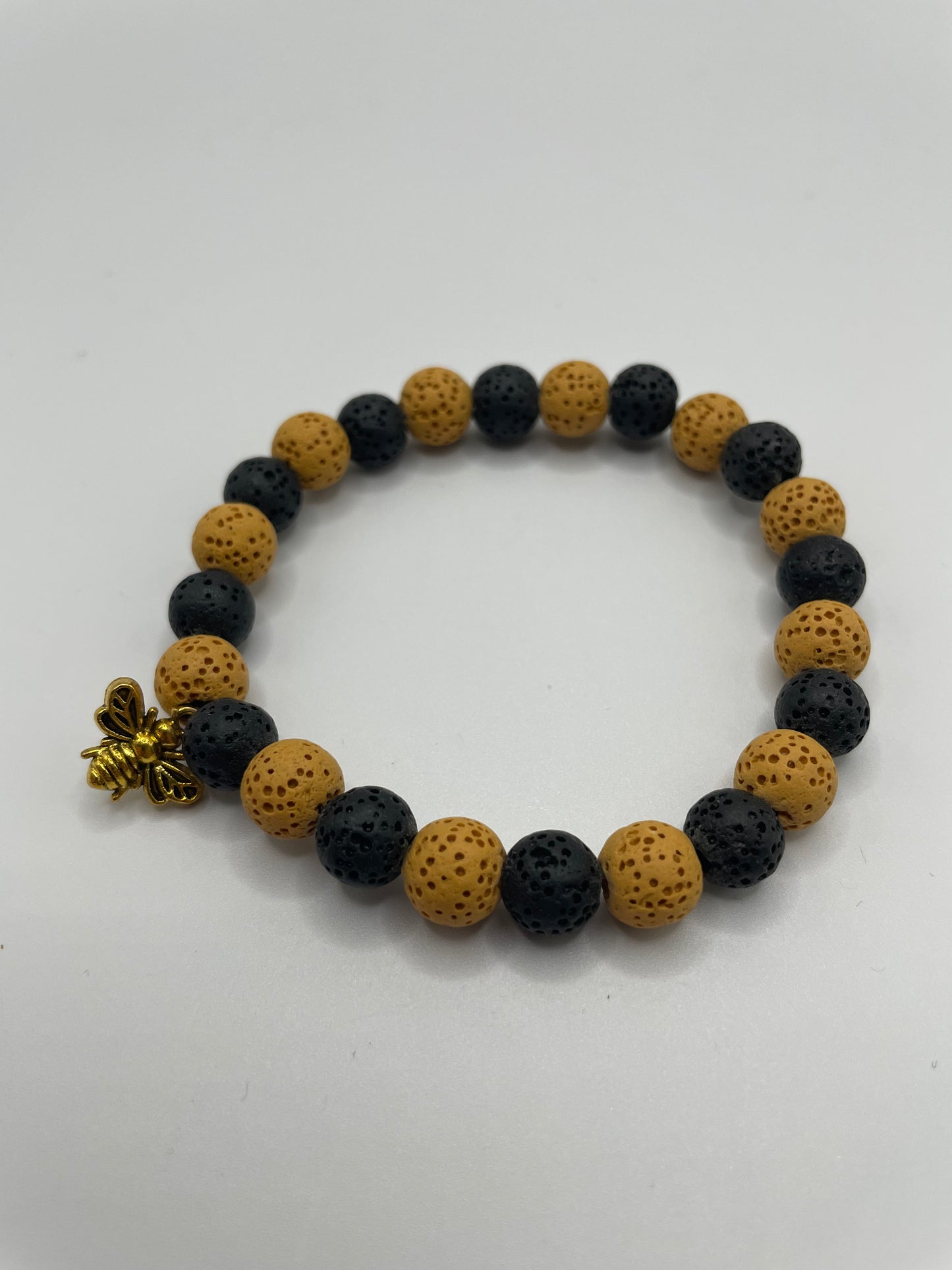 Yellow and Black Lava Beaded Bracelet with Gold Bee Charm