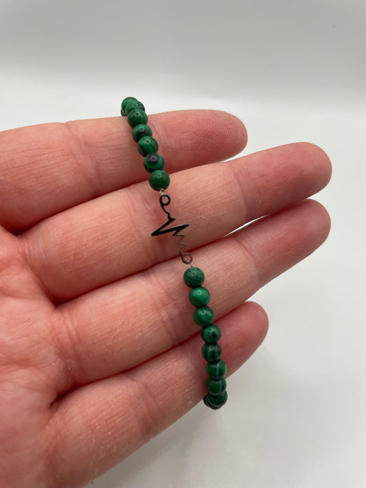 Green Beaded Bracelet with Heartbeat Charm
