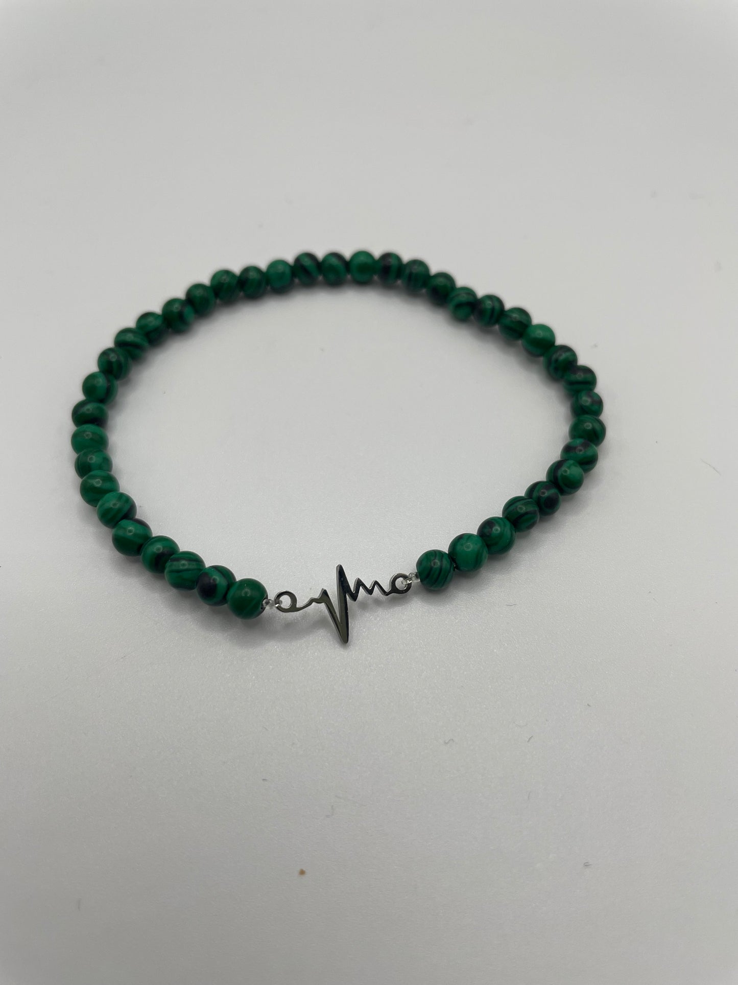 Green Beaded Bracelet with Heartbeat Charm