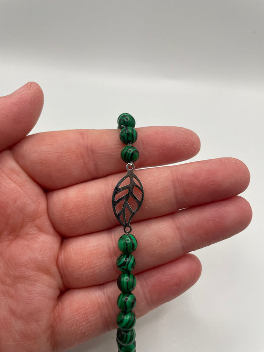 Green Beaded Bracelet with Leaf Charm