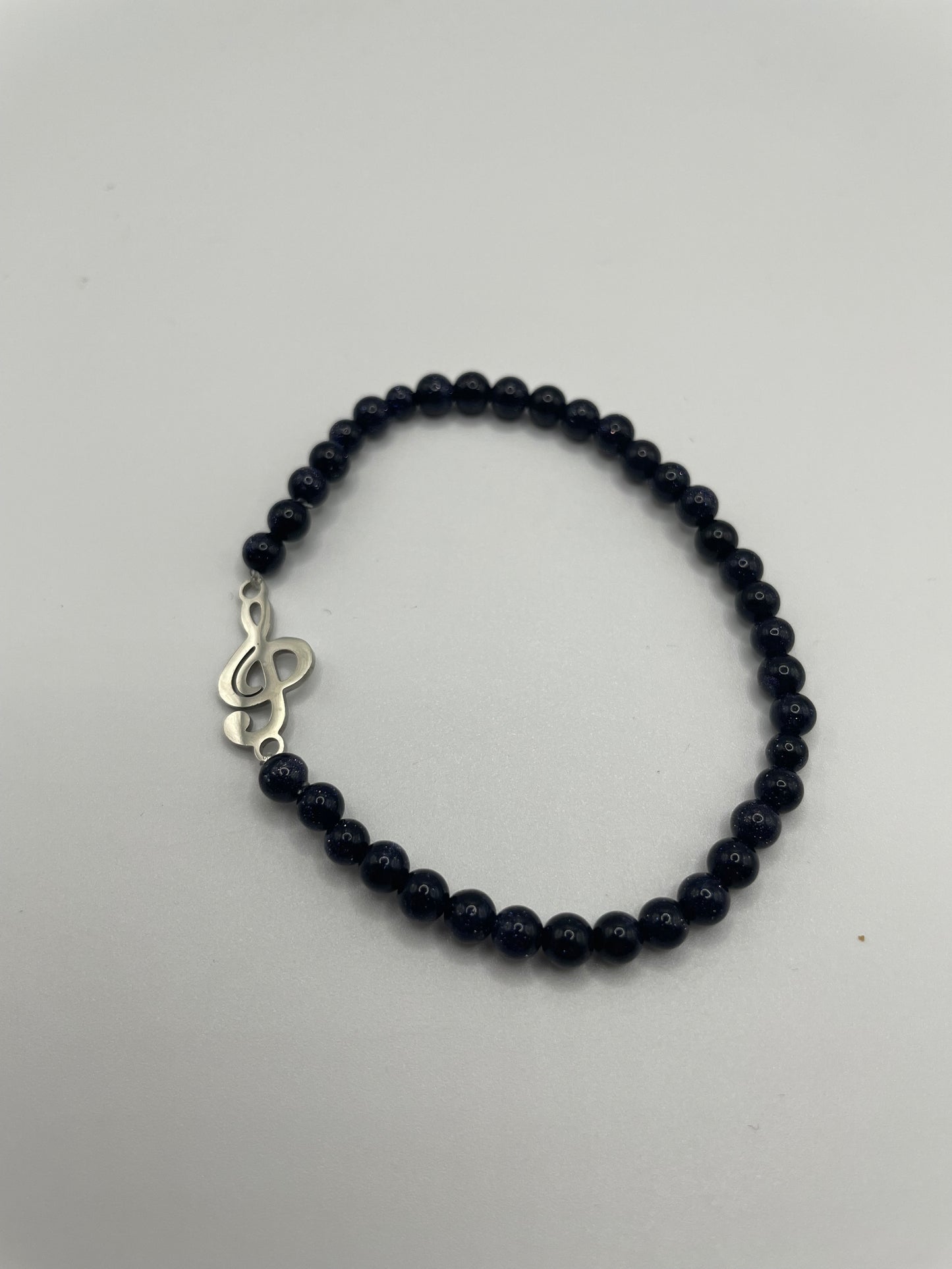 Blue Goldstone Beaded Bracelet with Treble Clef Charm