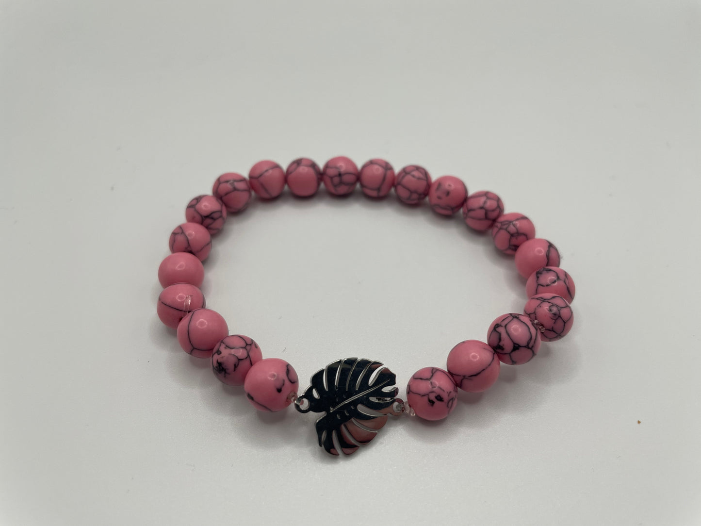 Pink Beaded Bracelet with Monstera Leaf Charm