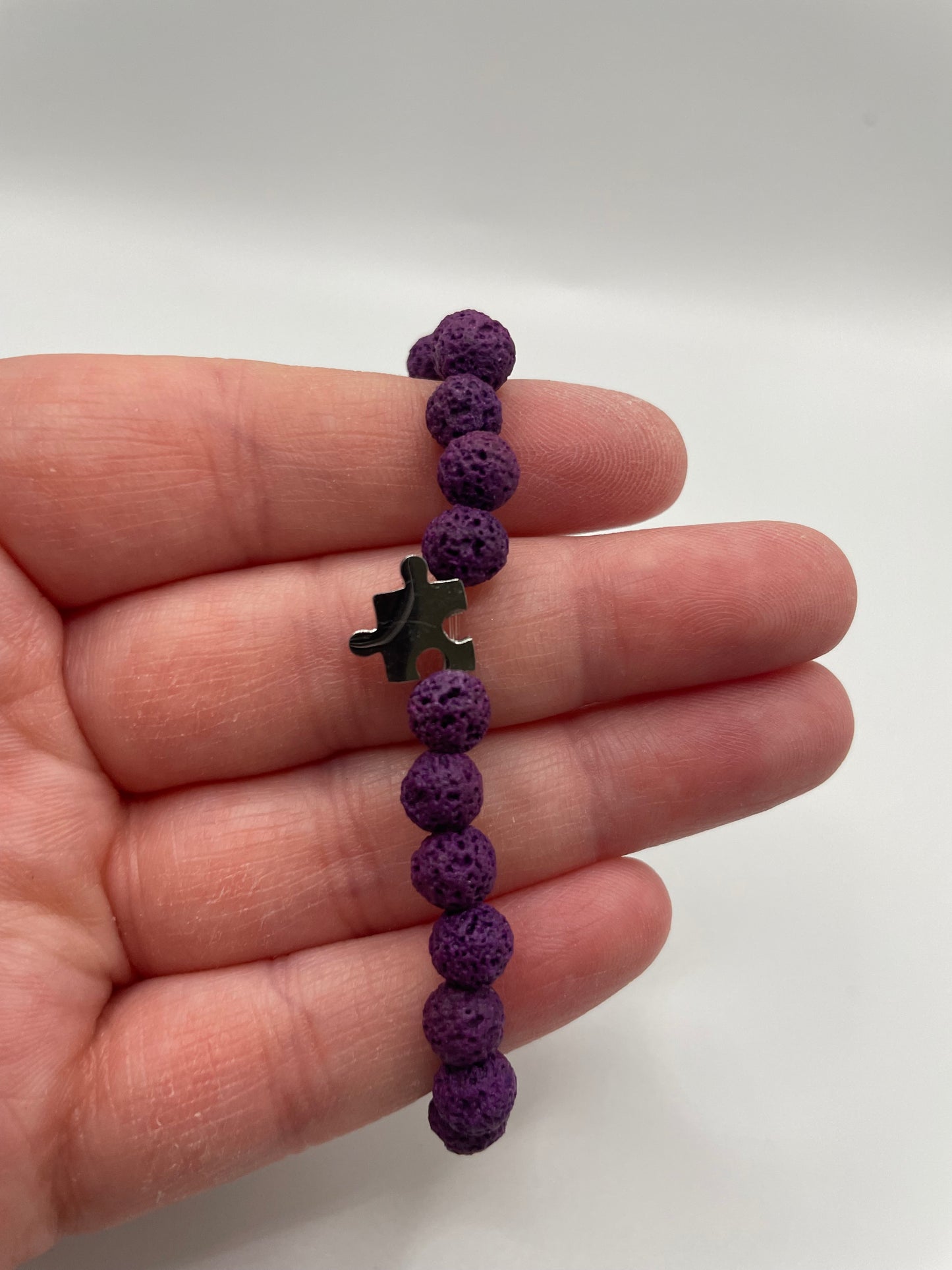 Purple Lava Stone Bracelet with Puzzle Charm