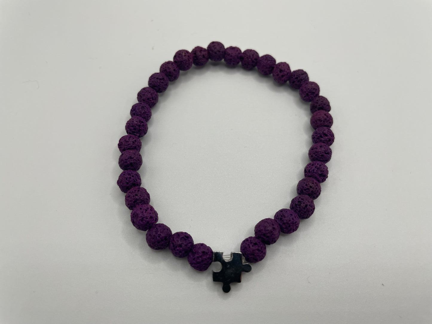 Purple Lava Stone Bracelet with Puzzle Charm