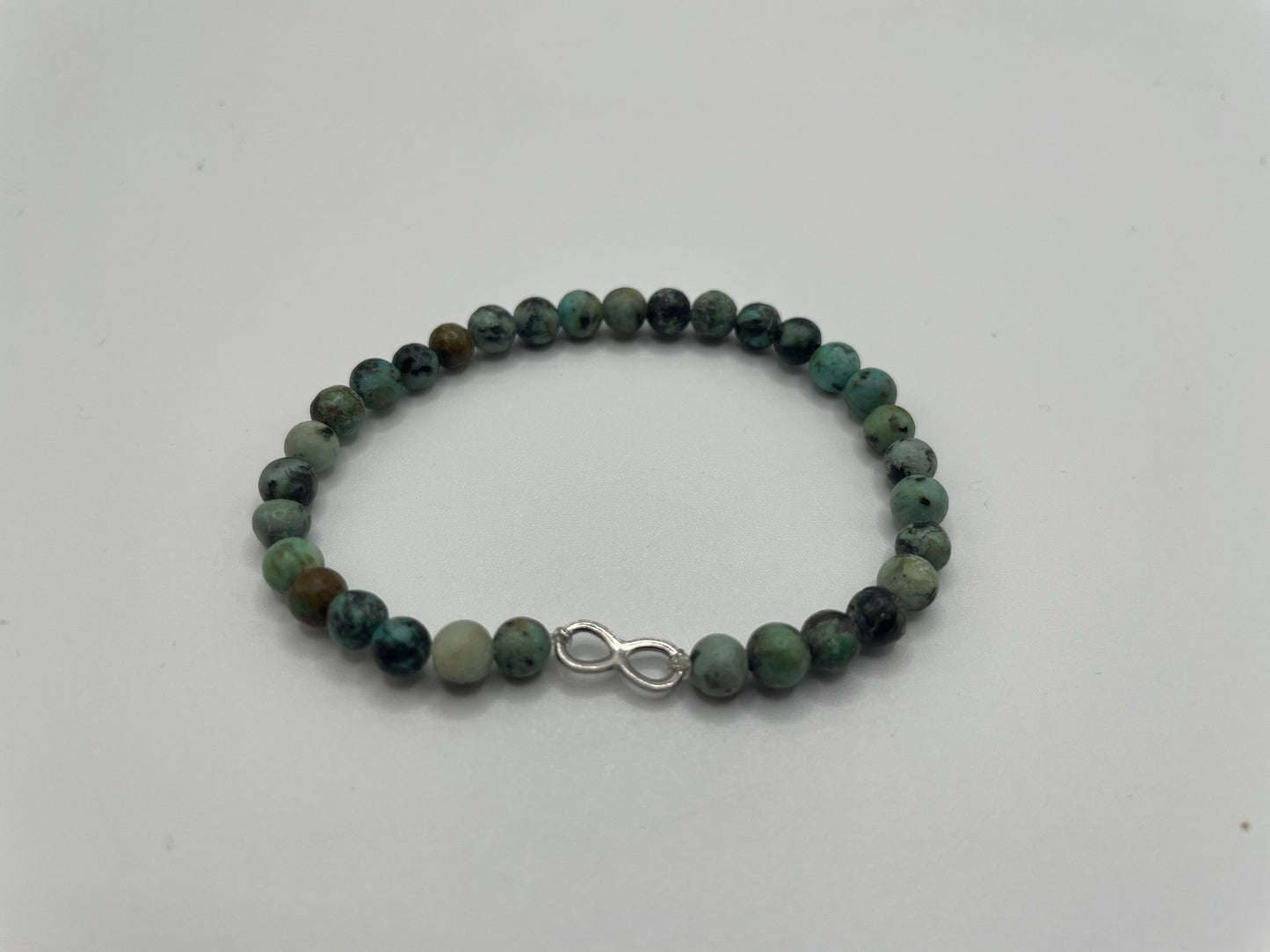 Green Beaded Bracelet with Infinity Charm