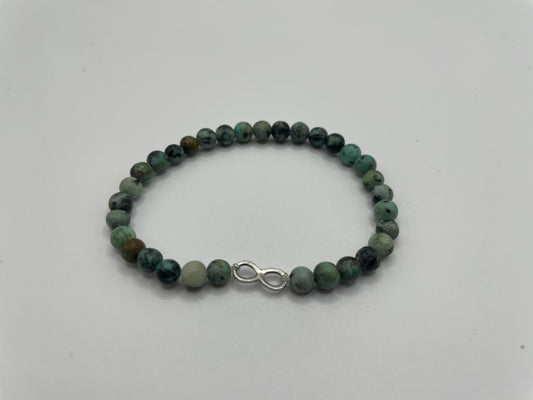 Green Beaded Bracelet with Infinity Charm