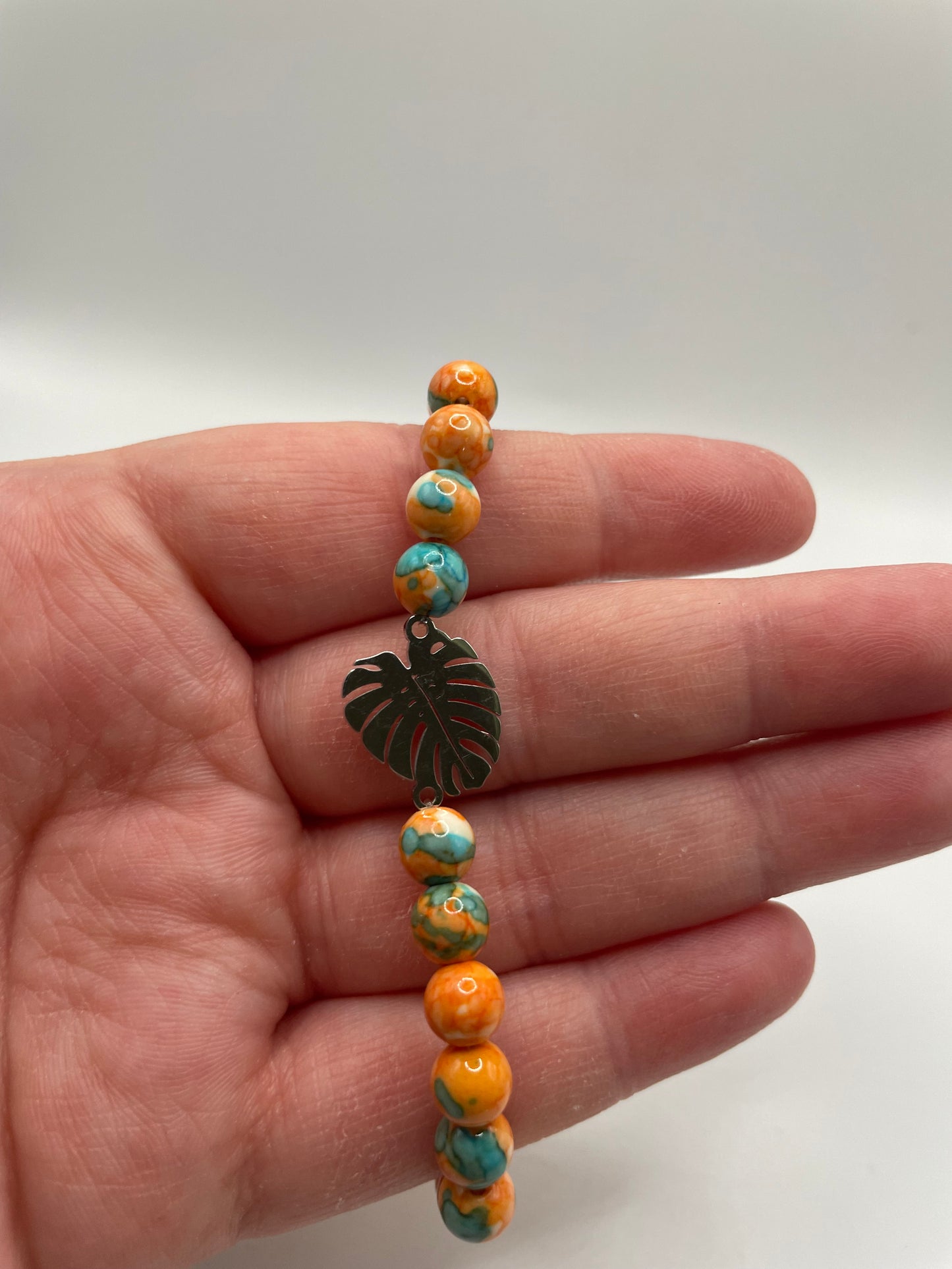 Orange and Turquoise Beaded Bracelet with Stainless Steel Charm