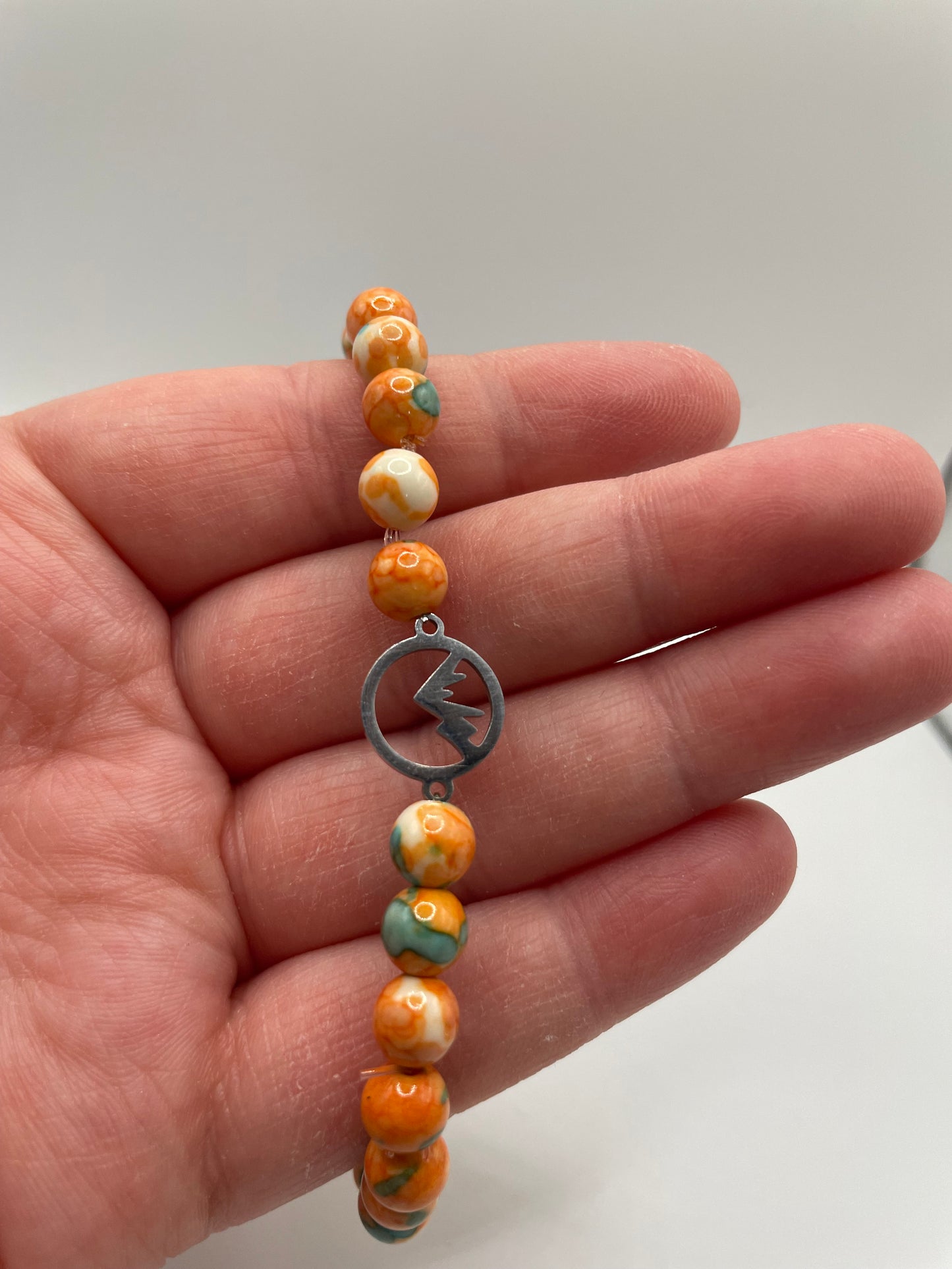 Orange and Turquoise Beaded Bracelet with Stainless Steel Charm