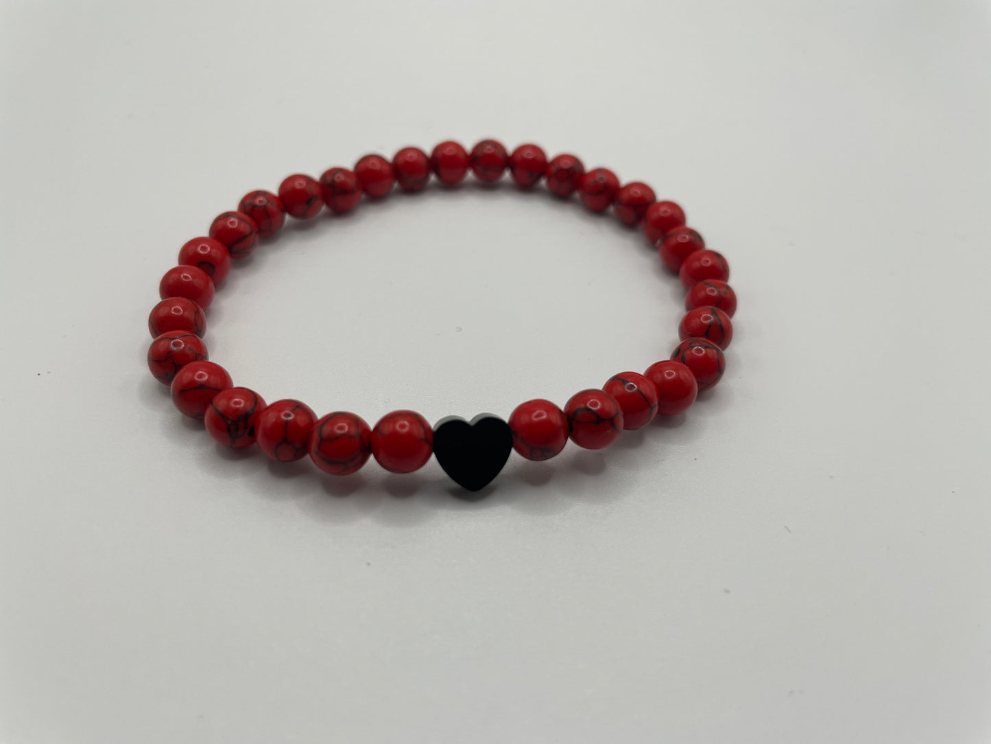 Red Beaded Bracelet with Black Heart Charm