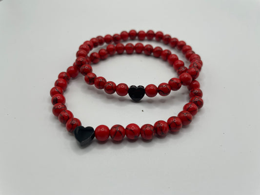 Red Beaded Bracelet with Black Heart Charm