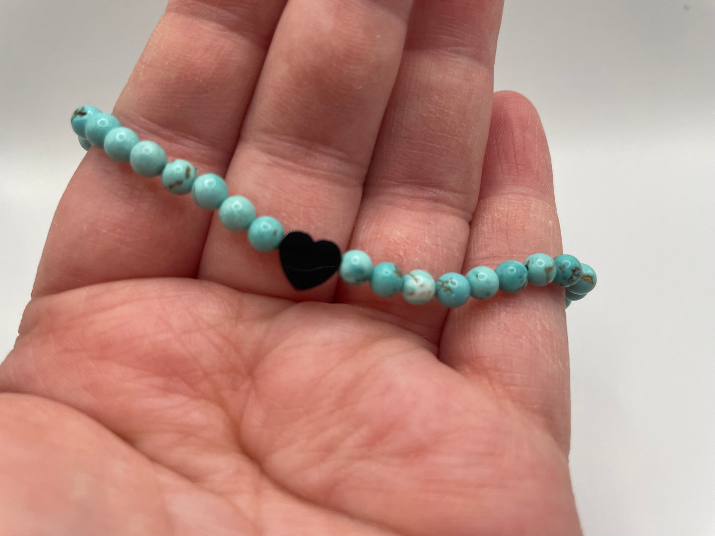 Turquoise Beaded Bracelet with Black Heart Charm