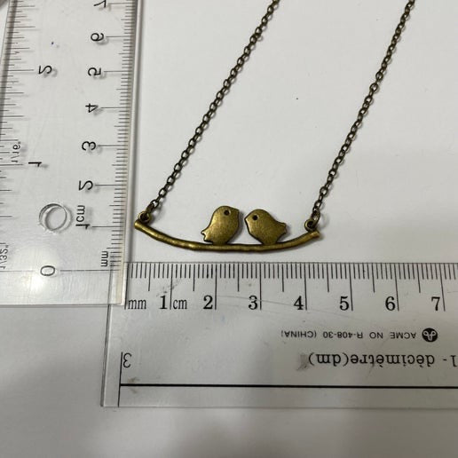 Two Birds on a Branch Necklace β Bronze Finish