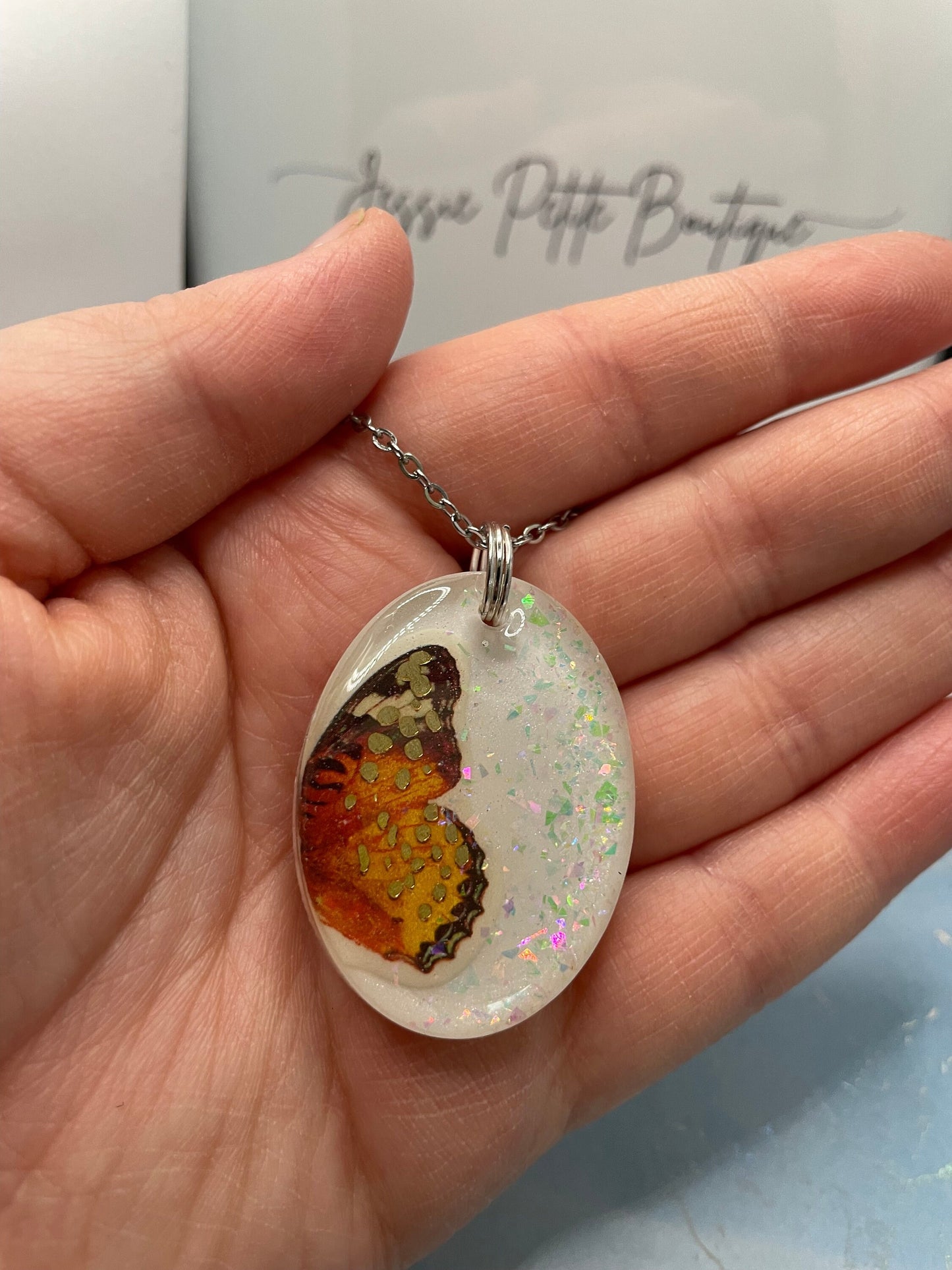 Orange Butterfly Glow Necklace – Oval Resin Pendant (Stainless Steel+Nickel Free)