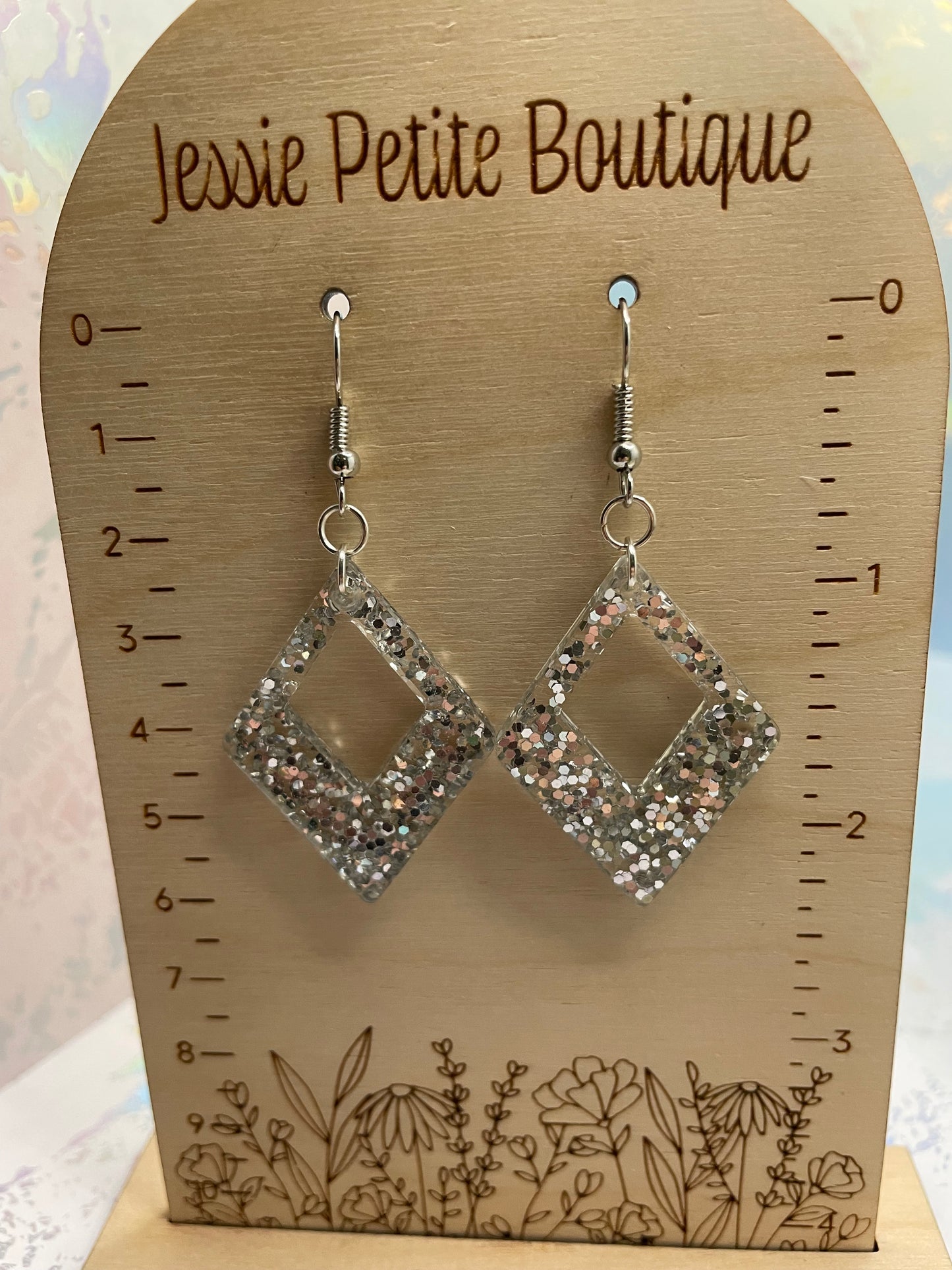 Boucles d'oreilles losange gris scintillant