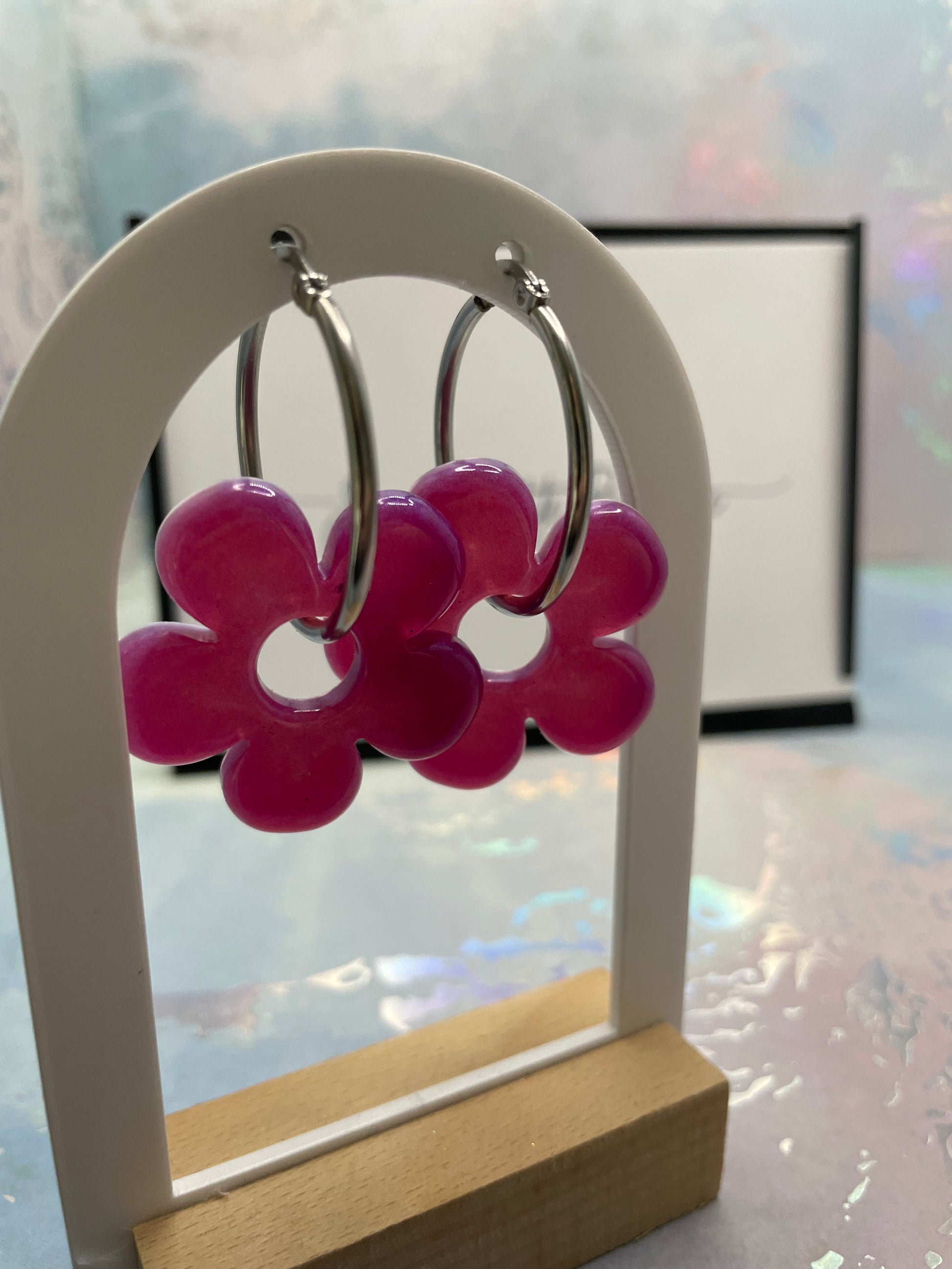 Floral-shaped hair clip on a white background