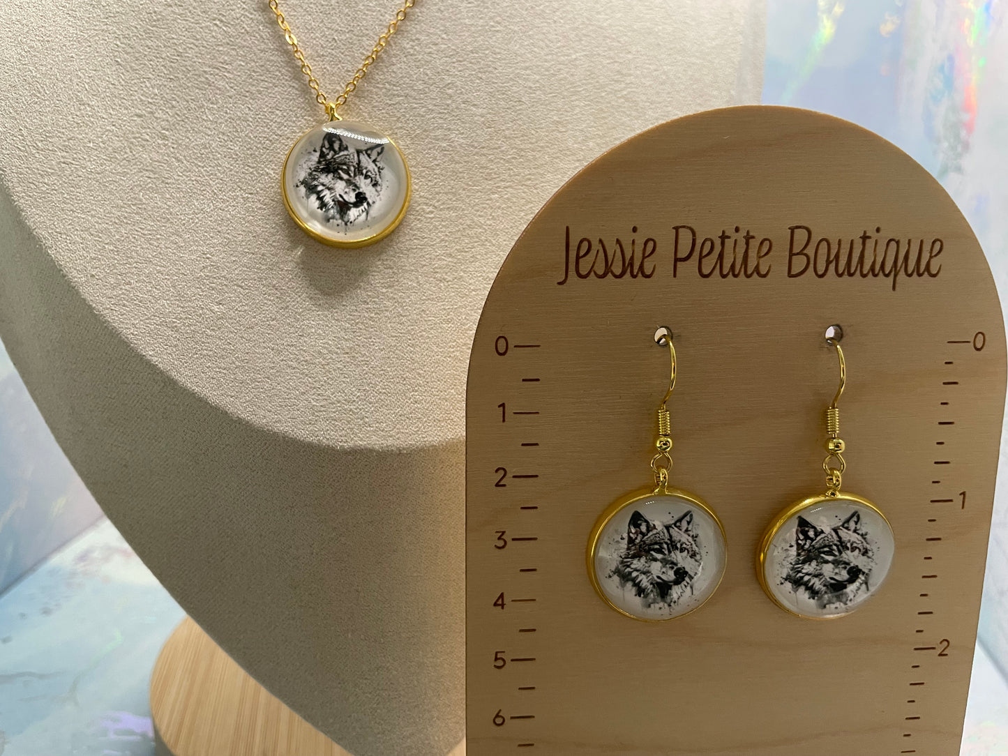 Jewelry set with pendant and earrings on a display card from Jessie Petite Boutique.