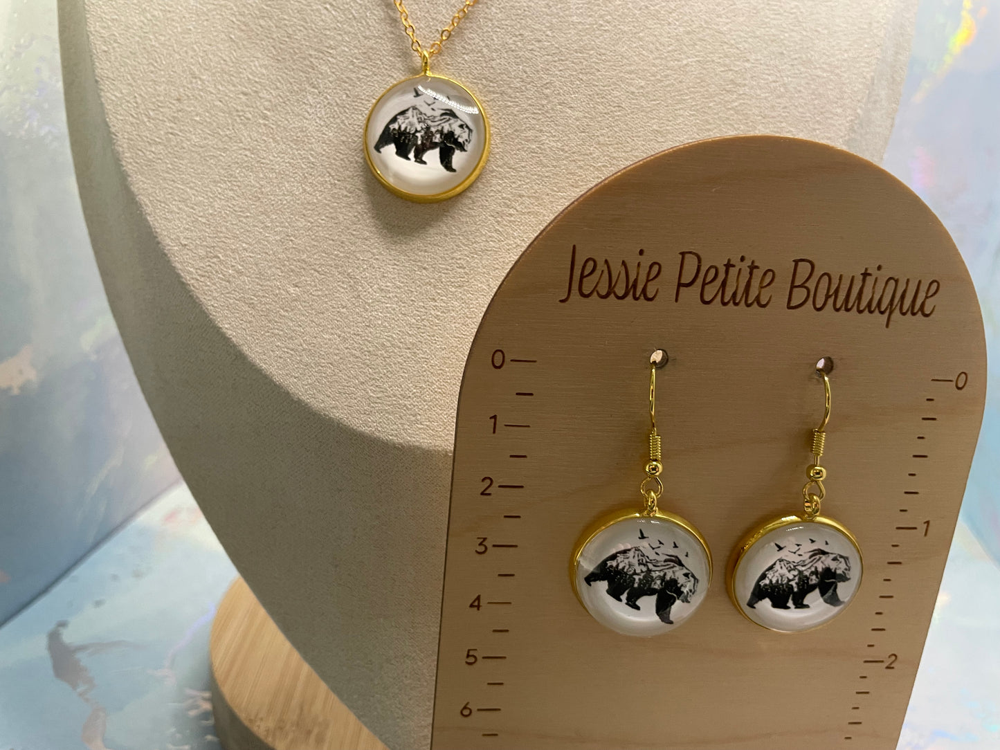 Jewelry set with necklace and earrings on a 'Jessie Petite Boutique' card.