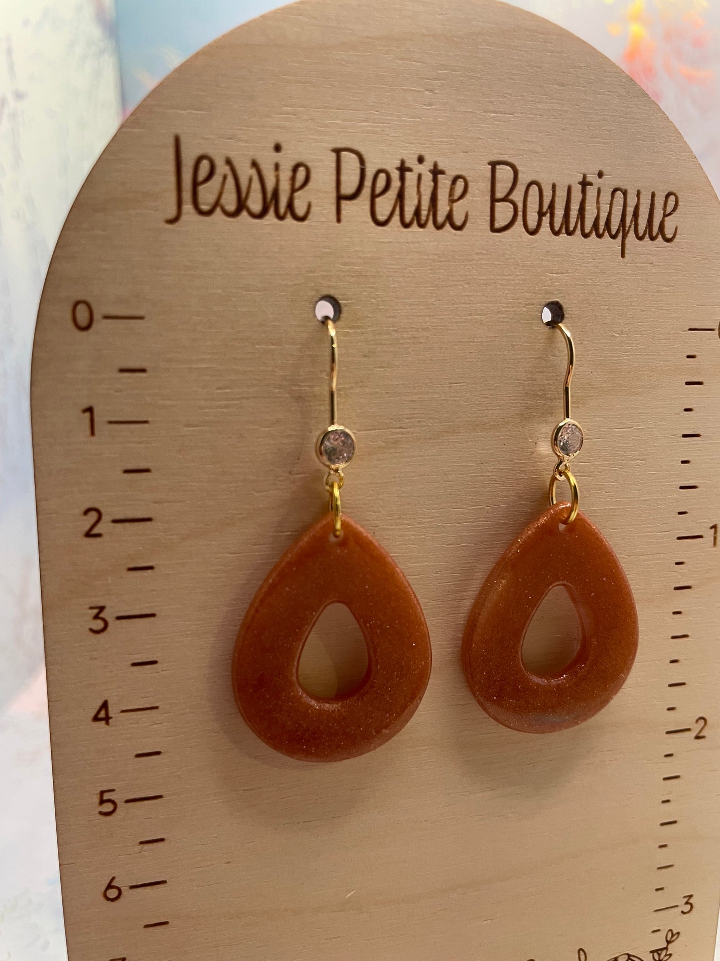 Boucles d'oreilles goutte en bronze avec zircon