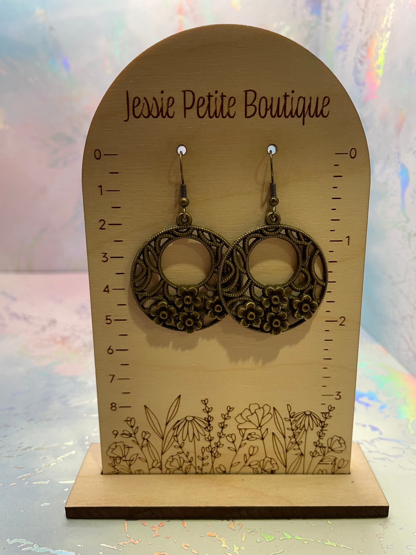 Boucles d'oreilles cercle avec fleurs en Bronze