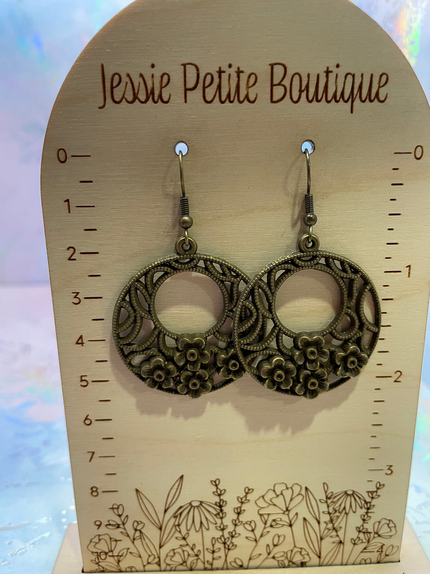 Boucles d'oreilles cercle avec fleurs en Bronze
