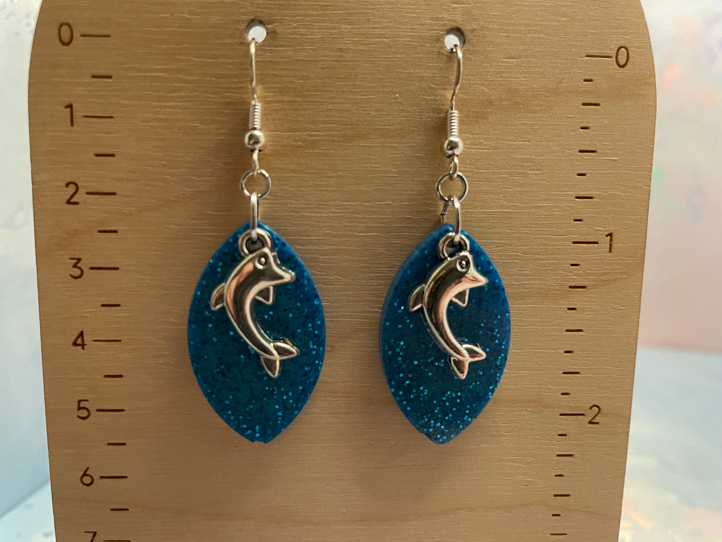 Sparkly Blue Oval Earrings with Dolphin Charm- NICKEL FREE