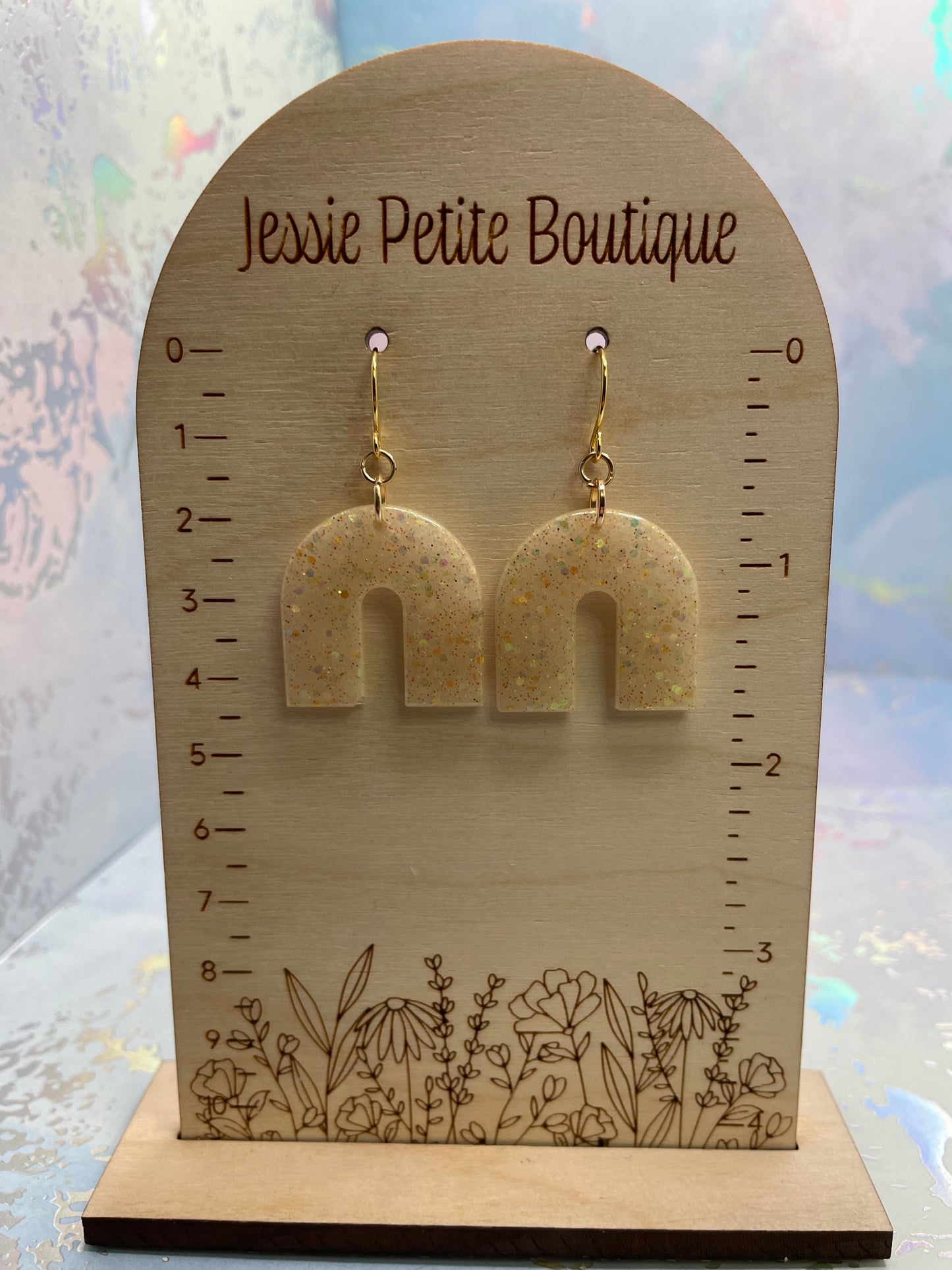 Boucles d'oreilles arche champagne scintillantes