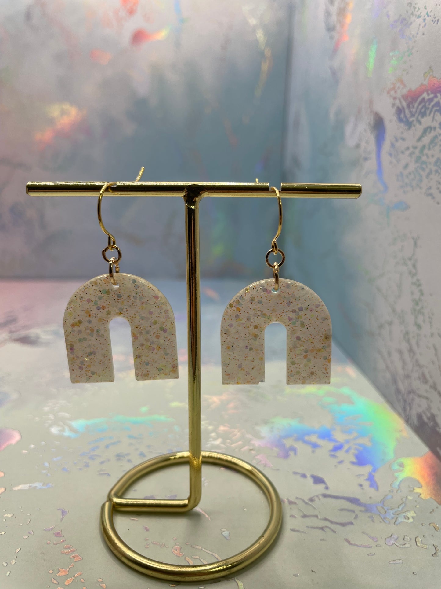Boucles d'oreilles arche champagne scintillantes