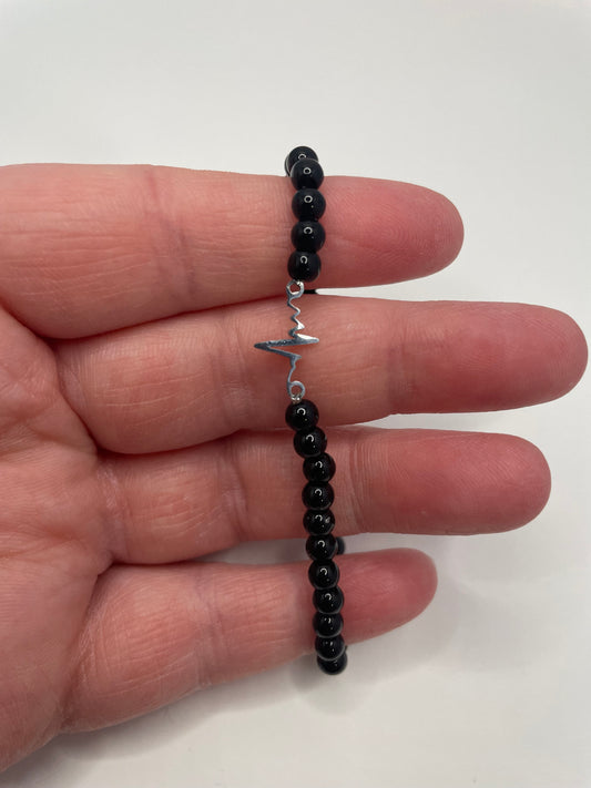 Bracelet en Billes Noires avec Breloque Électrocardiogramme