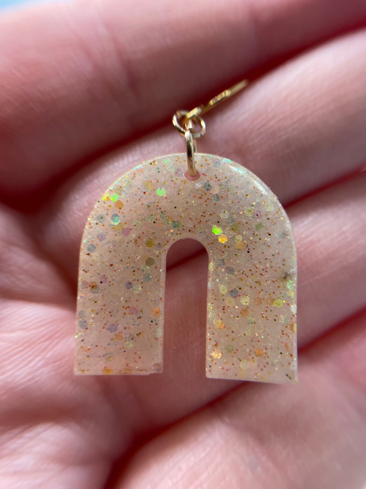 Boucles d'oreilles arche champagne scintillantes