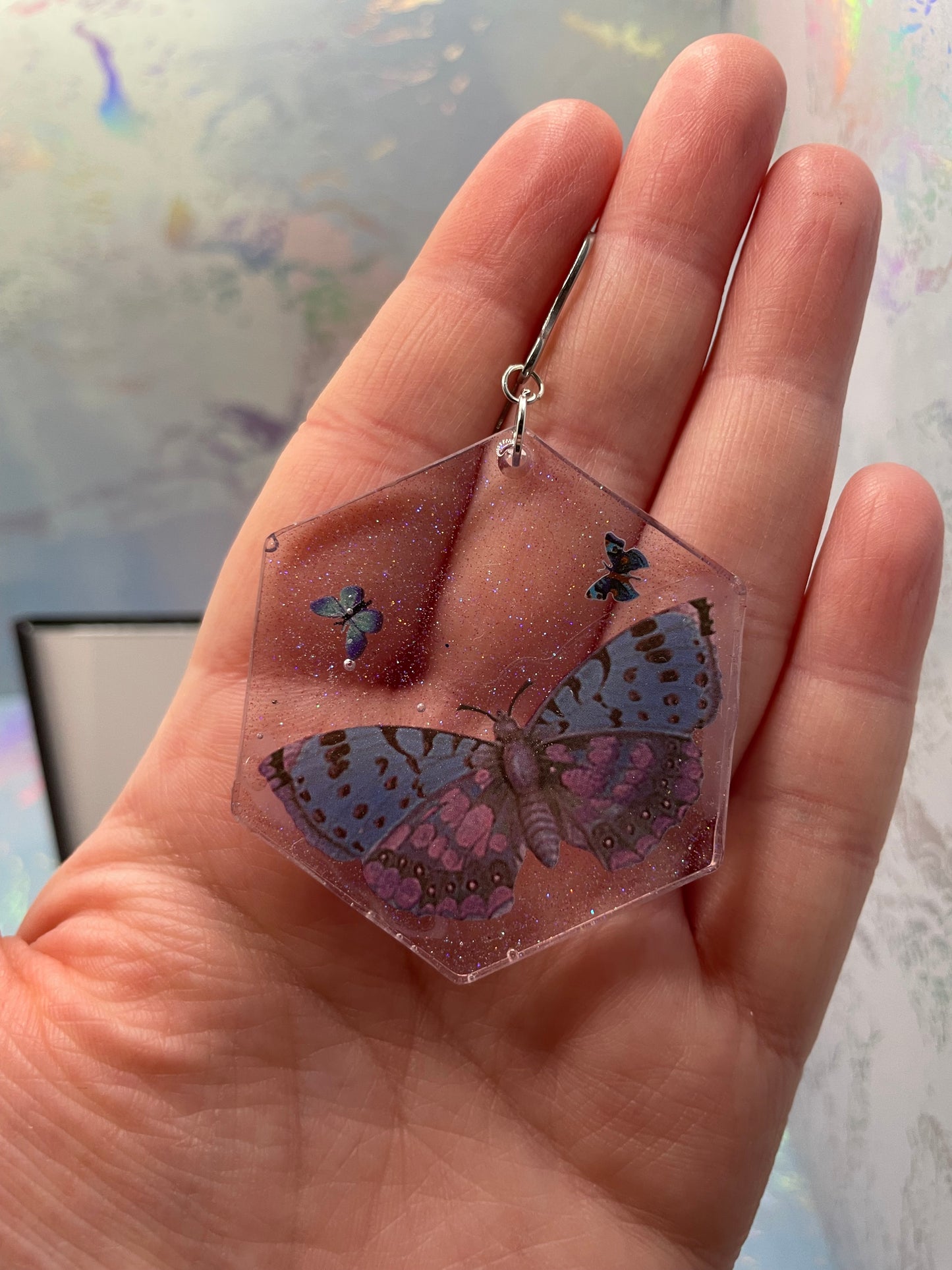 Boucle d'oreille papillon dans gros hexagon scintillant – Acier inoxydable