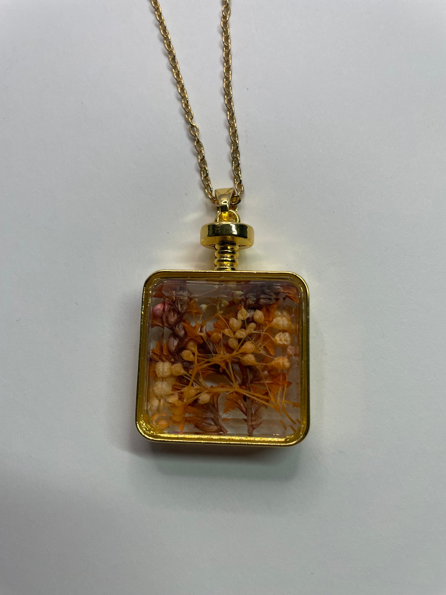 Collier bouteille avec fleurs séchées – Tons dorés et orangés