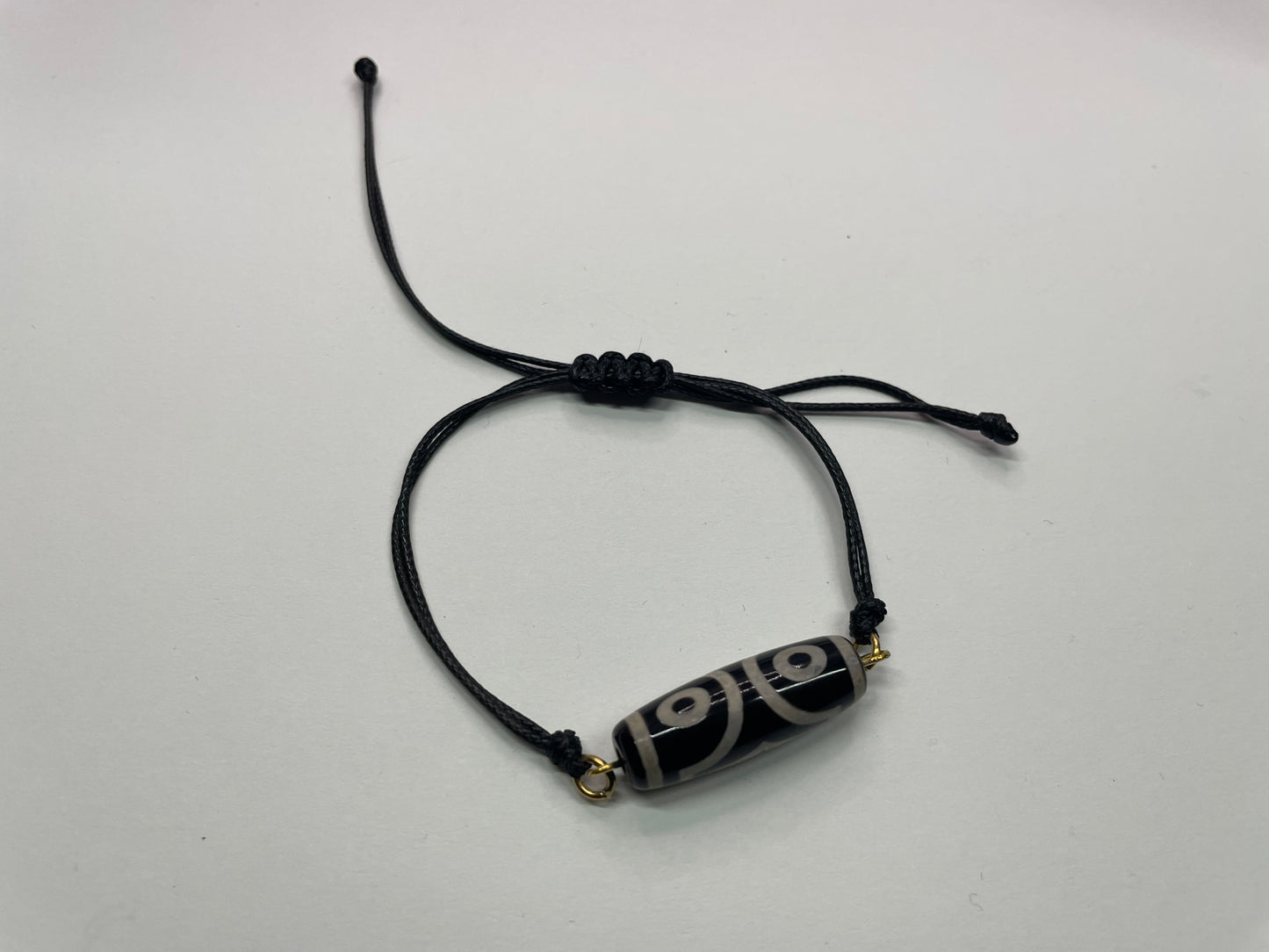 Bracelet ajustable bille géométrique noir et ivoire