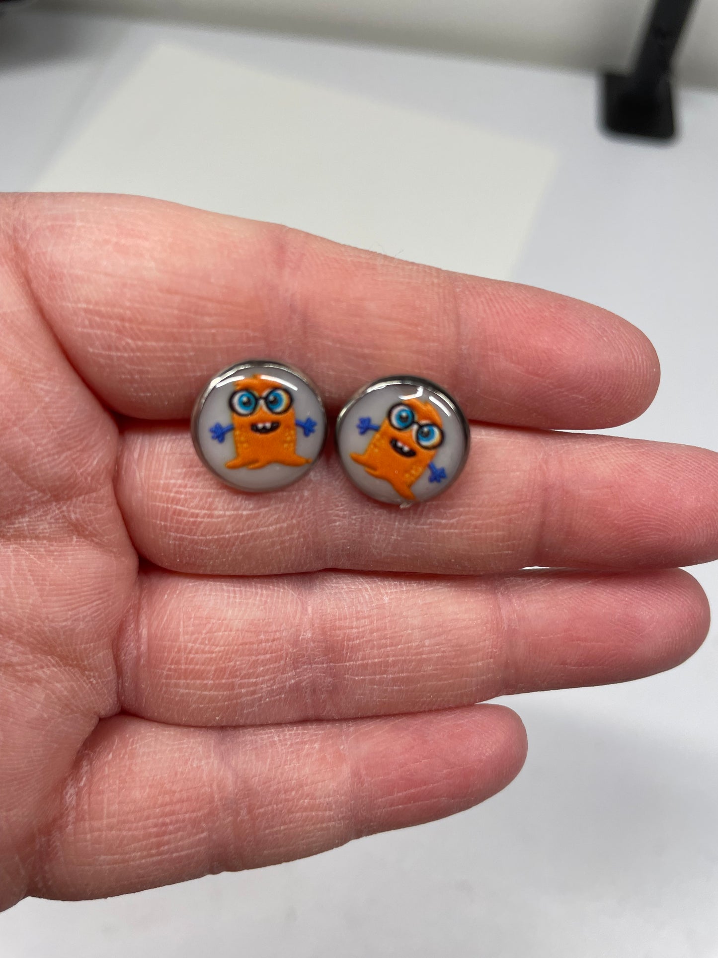 Boutons d'oreille monstre orange-Acier Inoxydable