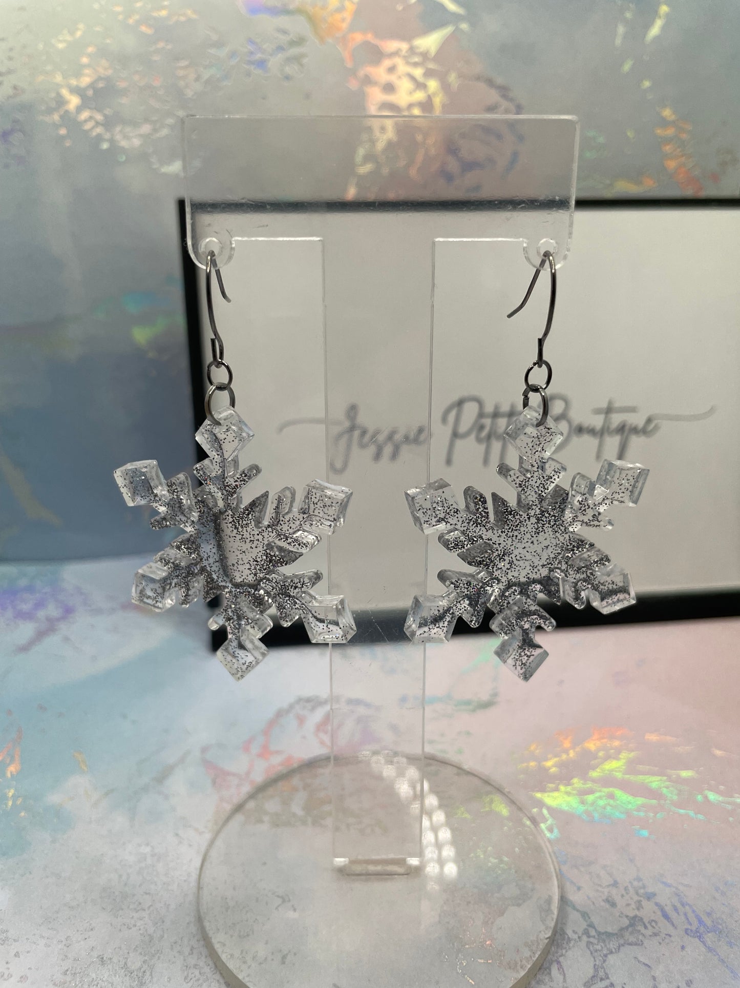 Boucles d'oreilles flocon de neige gris scintillant