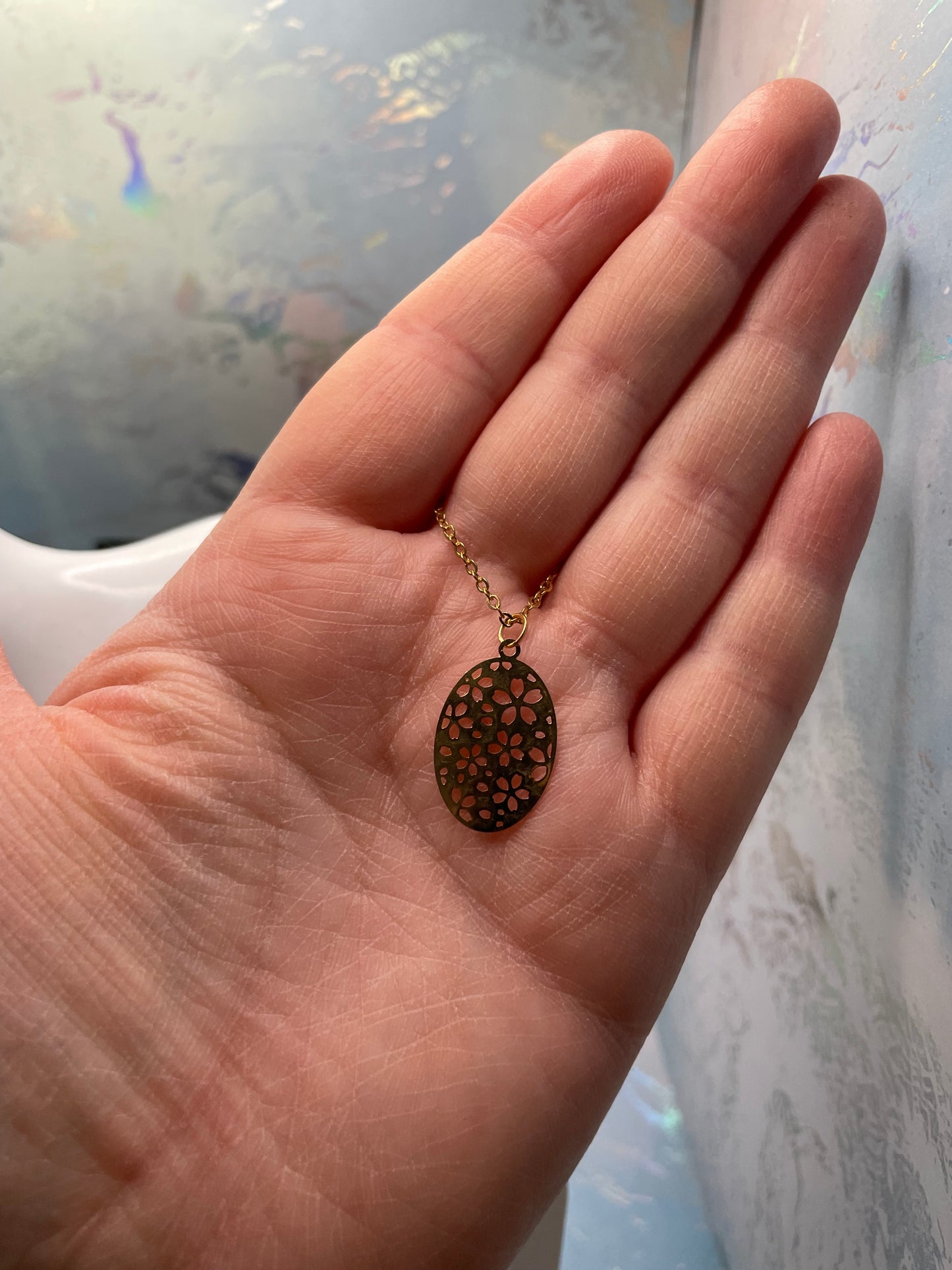 Ensemble ovales à motif floral doré