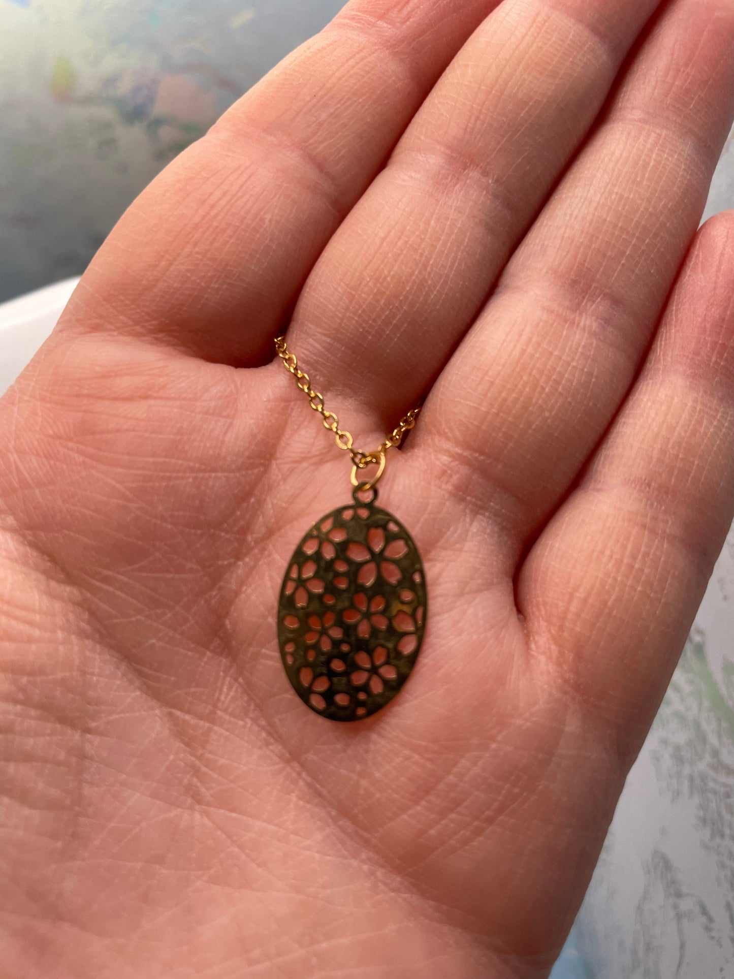 Ensemble ovales à motif floral doré