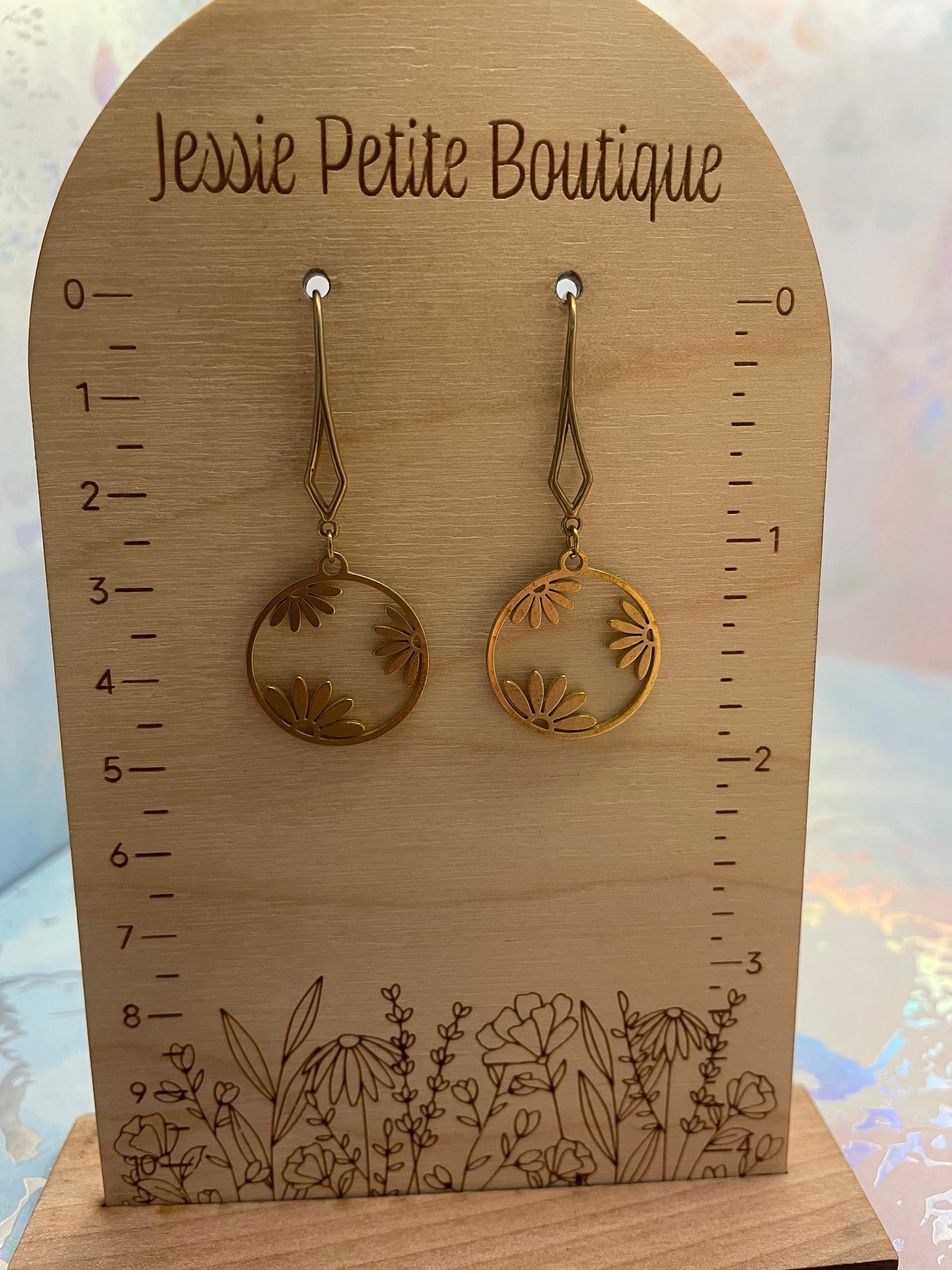 Boucles d’oreilles cercle floral dorée