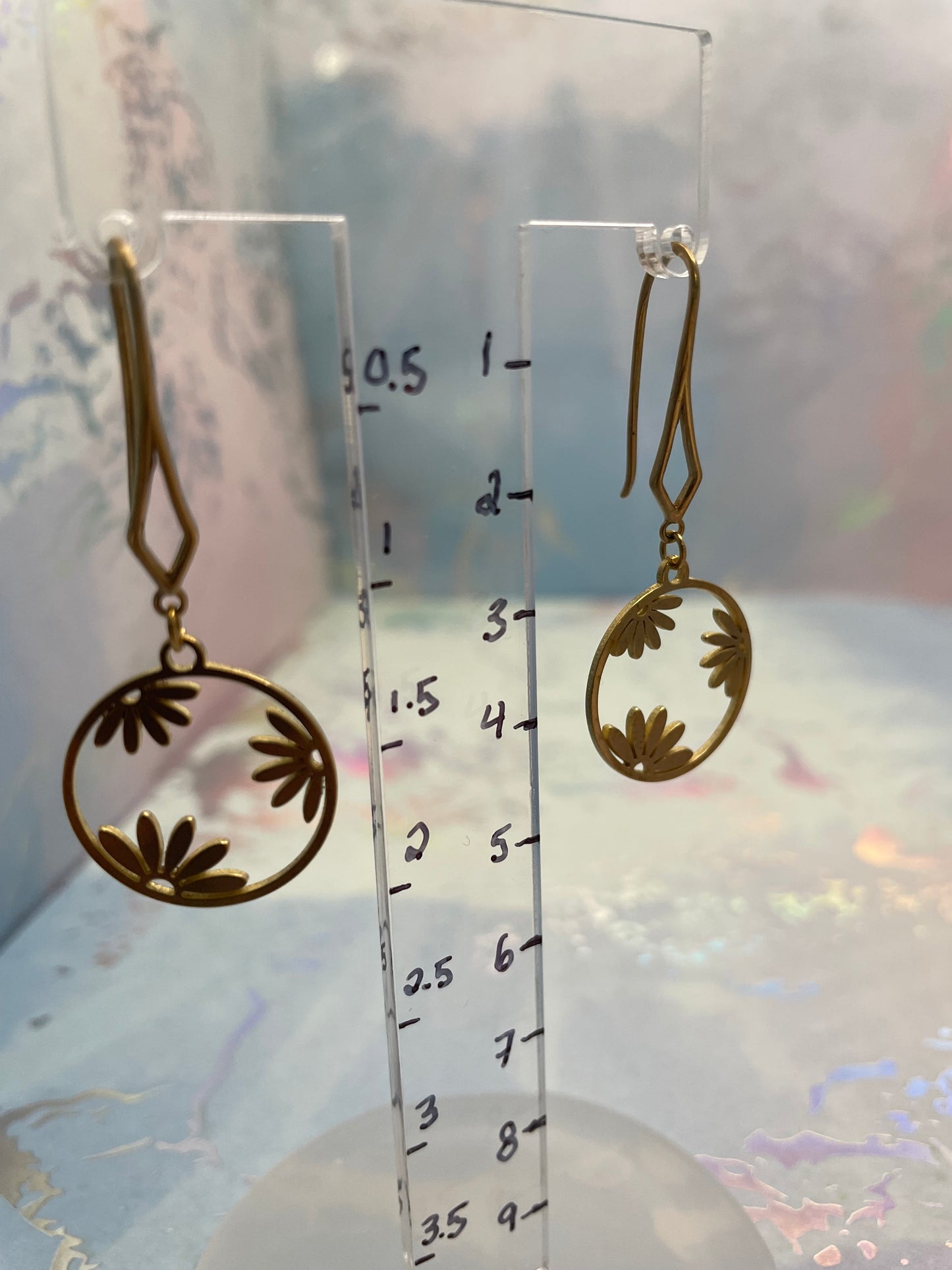 Boucles d’oreilles cercle floral dorée