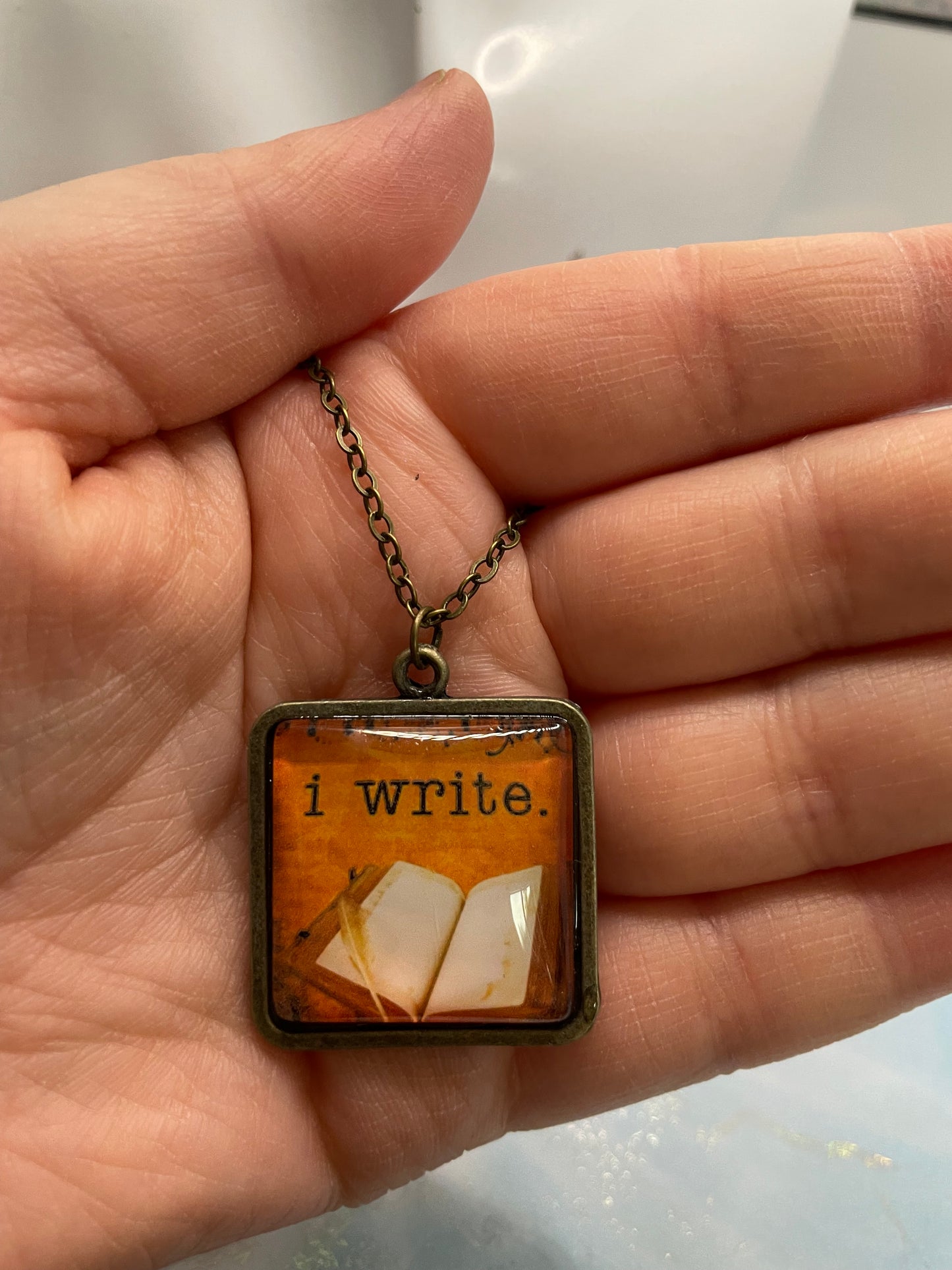 "I Write" Pendant Necklace - Bronze Square