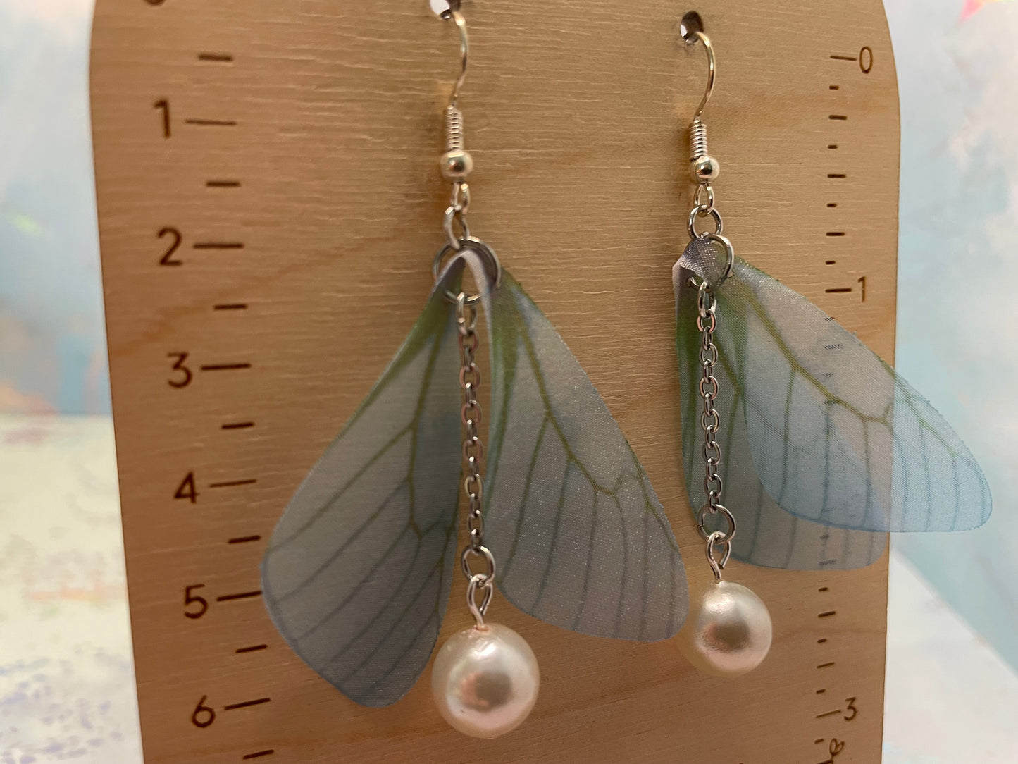 Boucles d’oreilles pendantes ailes de papillon avec billes